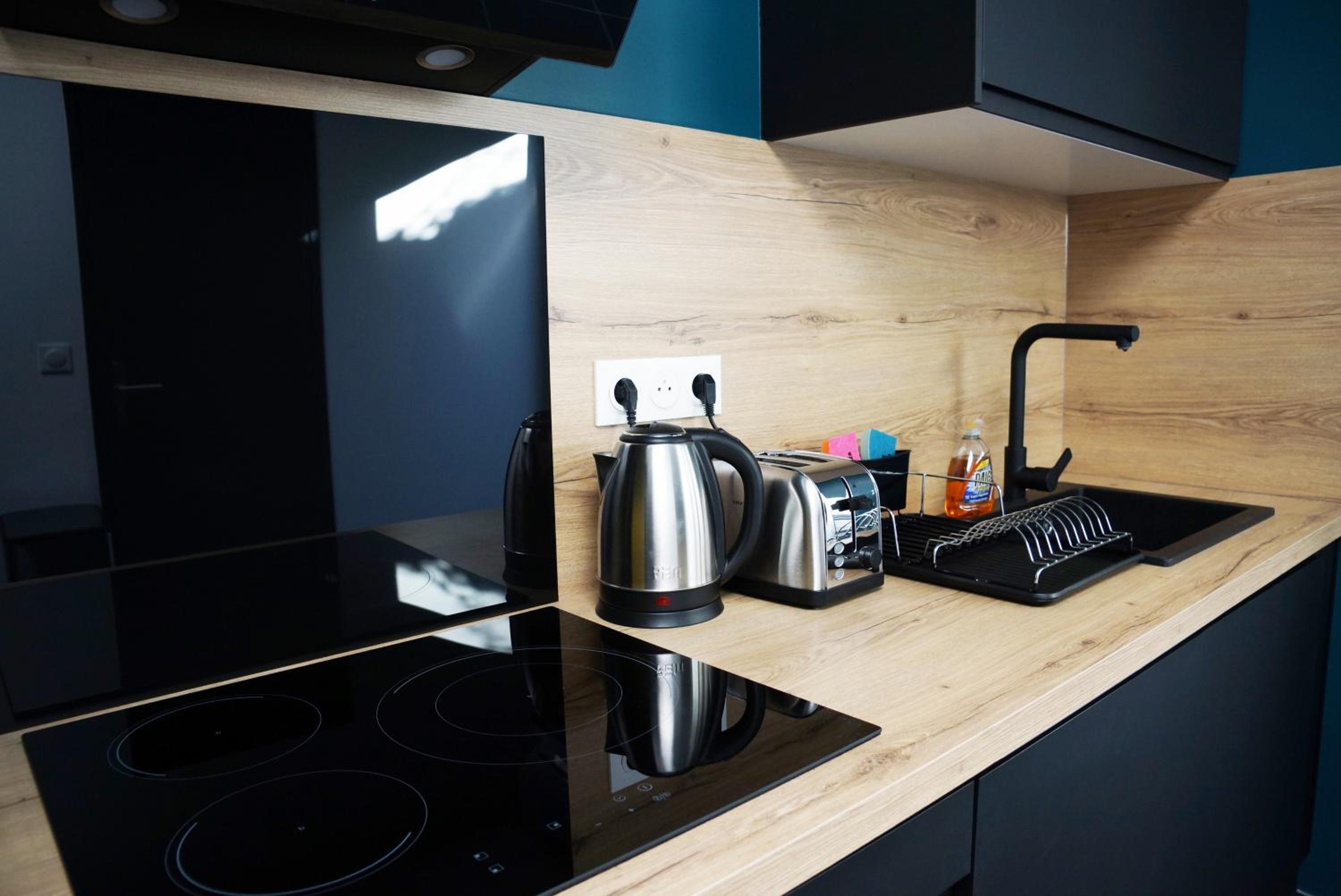 Three-Bedroom Apartment - Photo 11