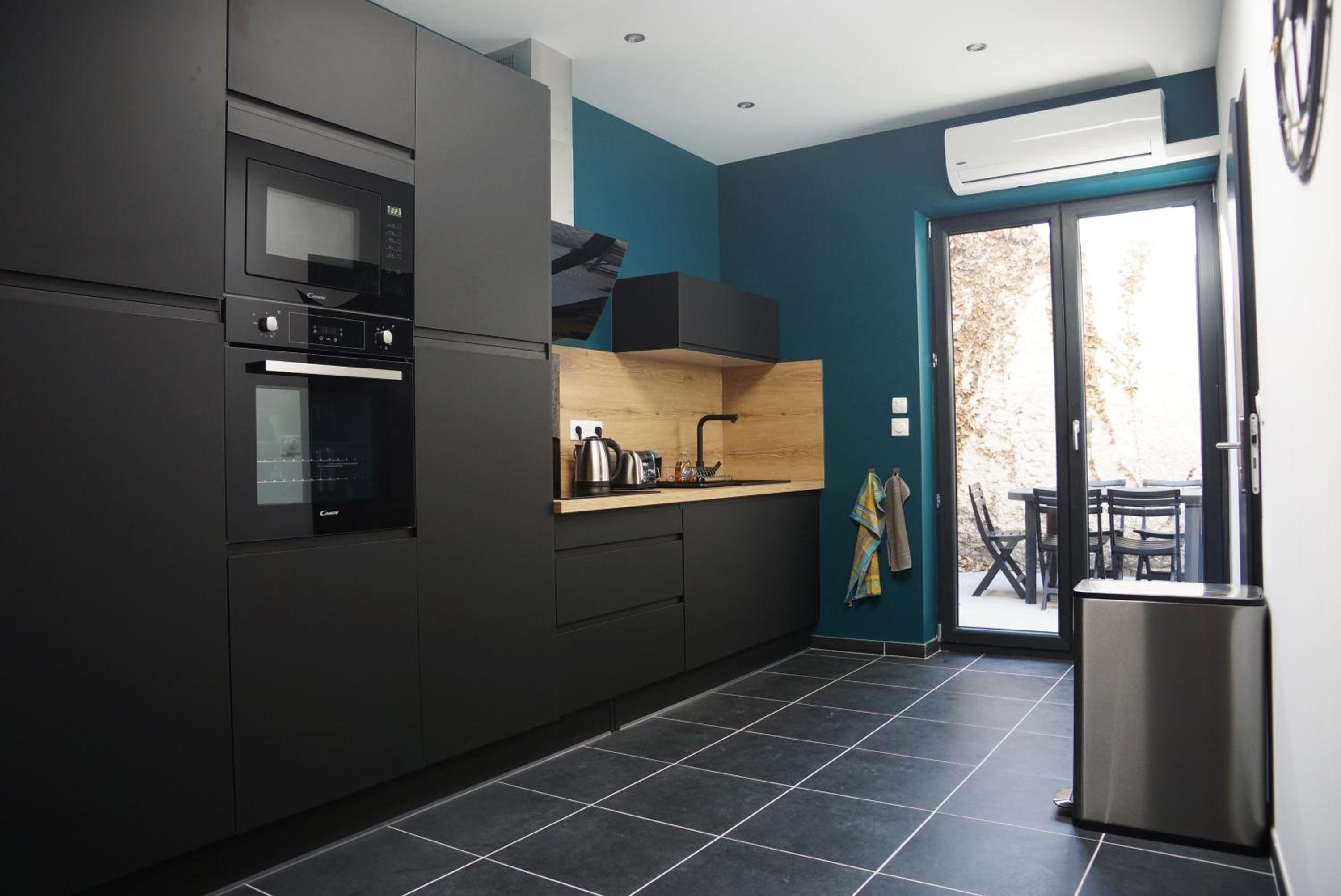Three-Bedroom Apartment - Photo 12