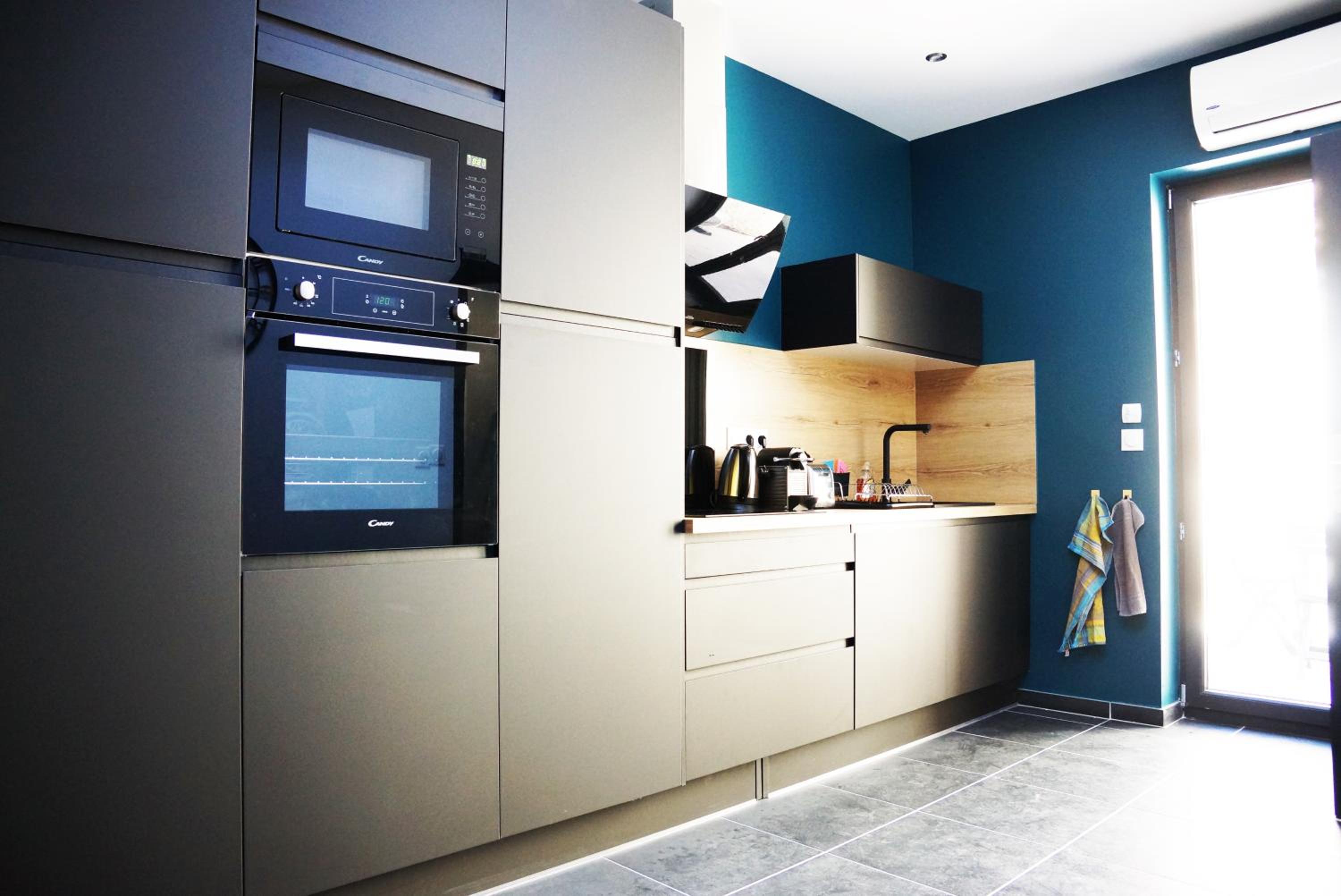 Three-Bedroom Apartment - Photo 33