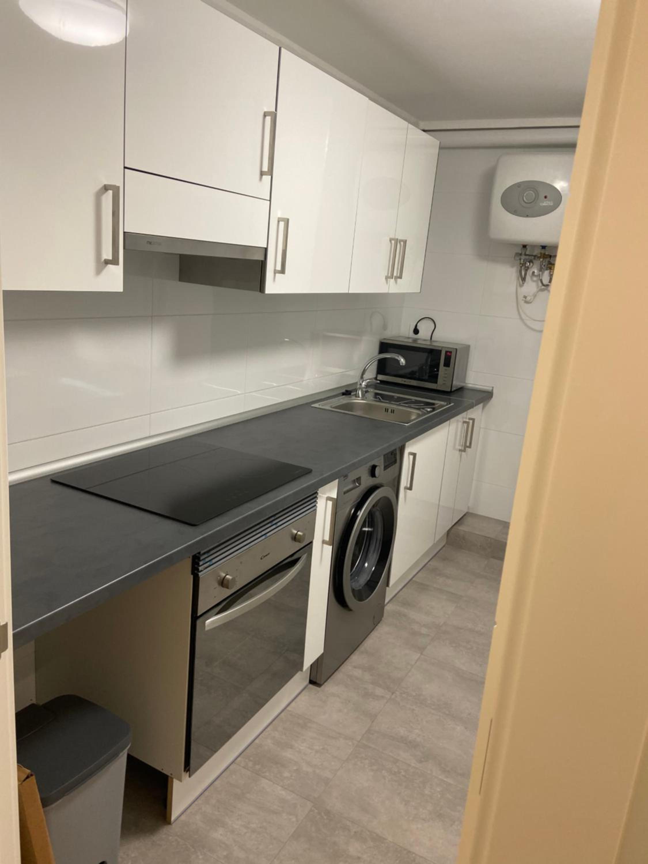 Three-Bedroom Apartment - Photo 11