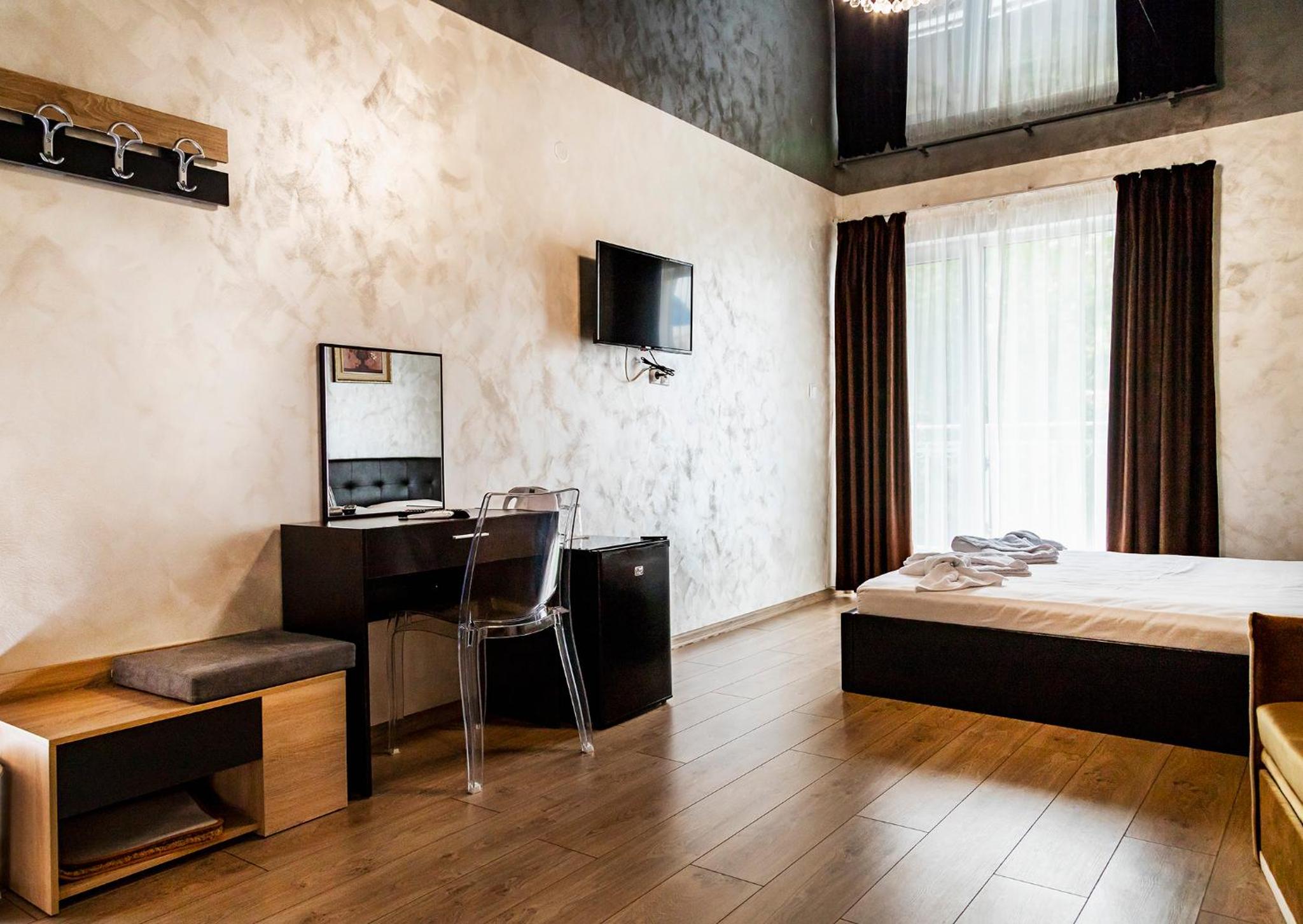 Deluxe Double Room with Balcony - Photo 1