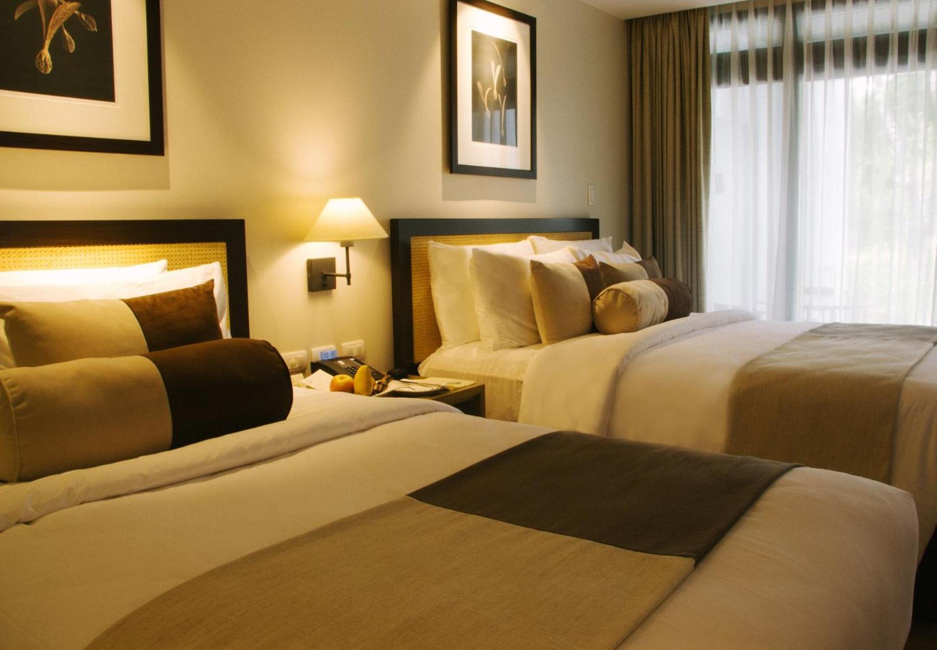1 Queen Bed and 1 Single Bed, Standard Room with Garden View photo 3