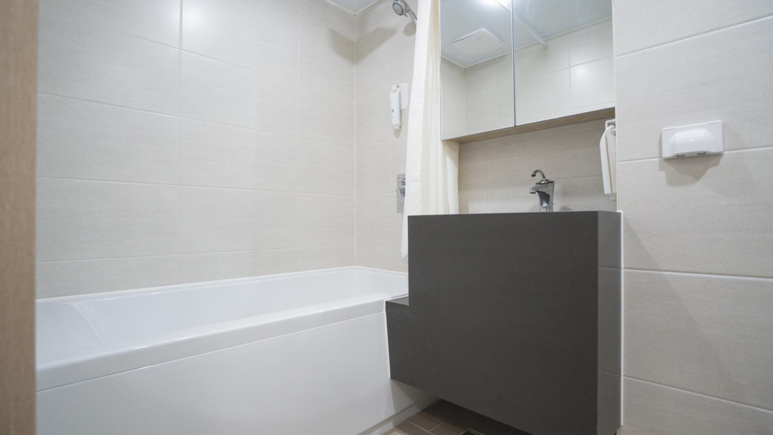 Deluxe Twin Room - Photo 10