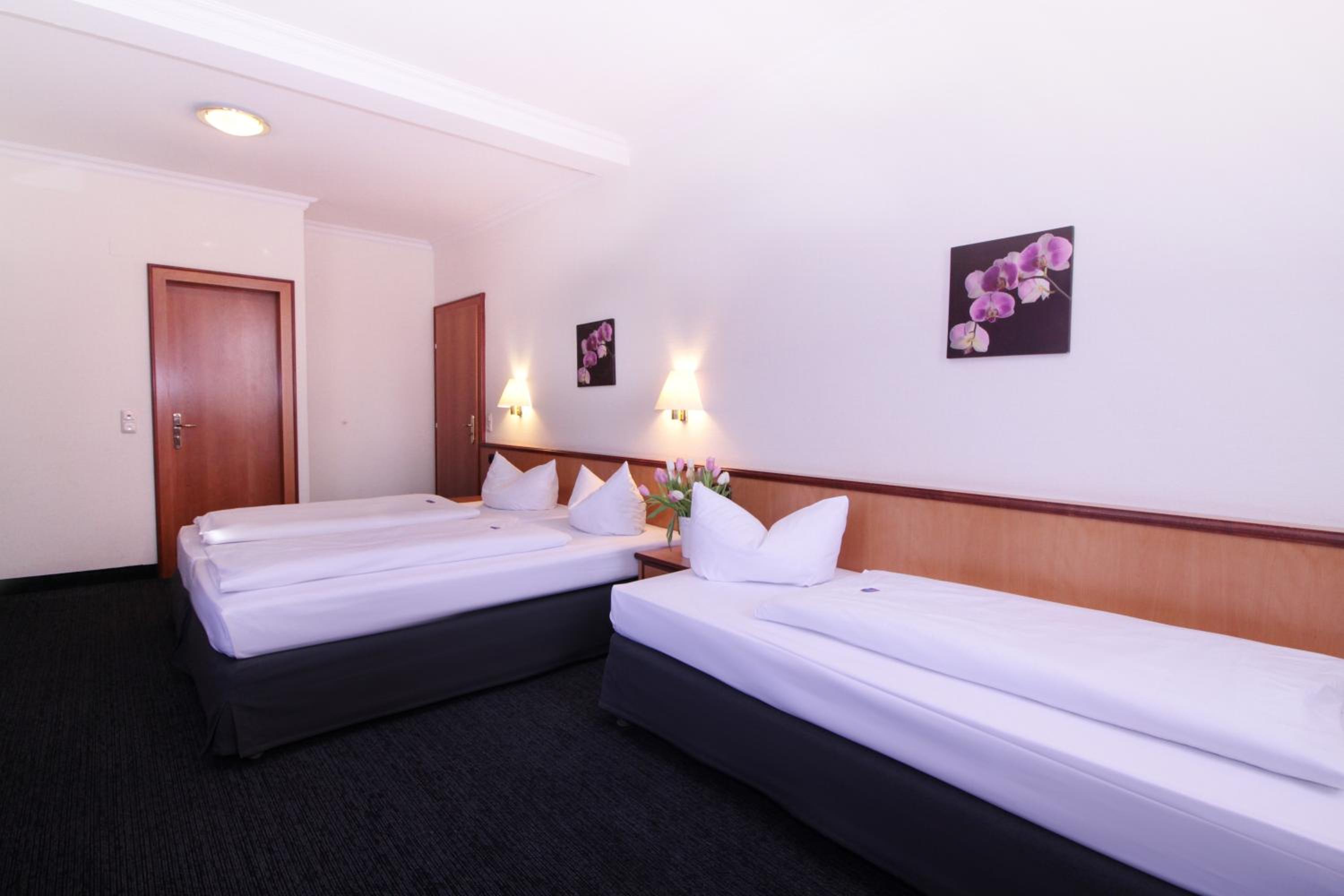 Triple Room - Photo 1