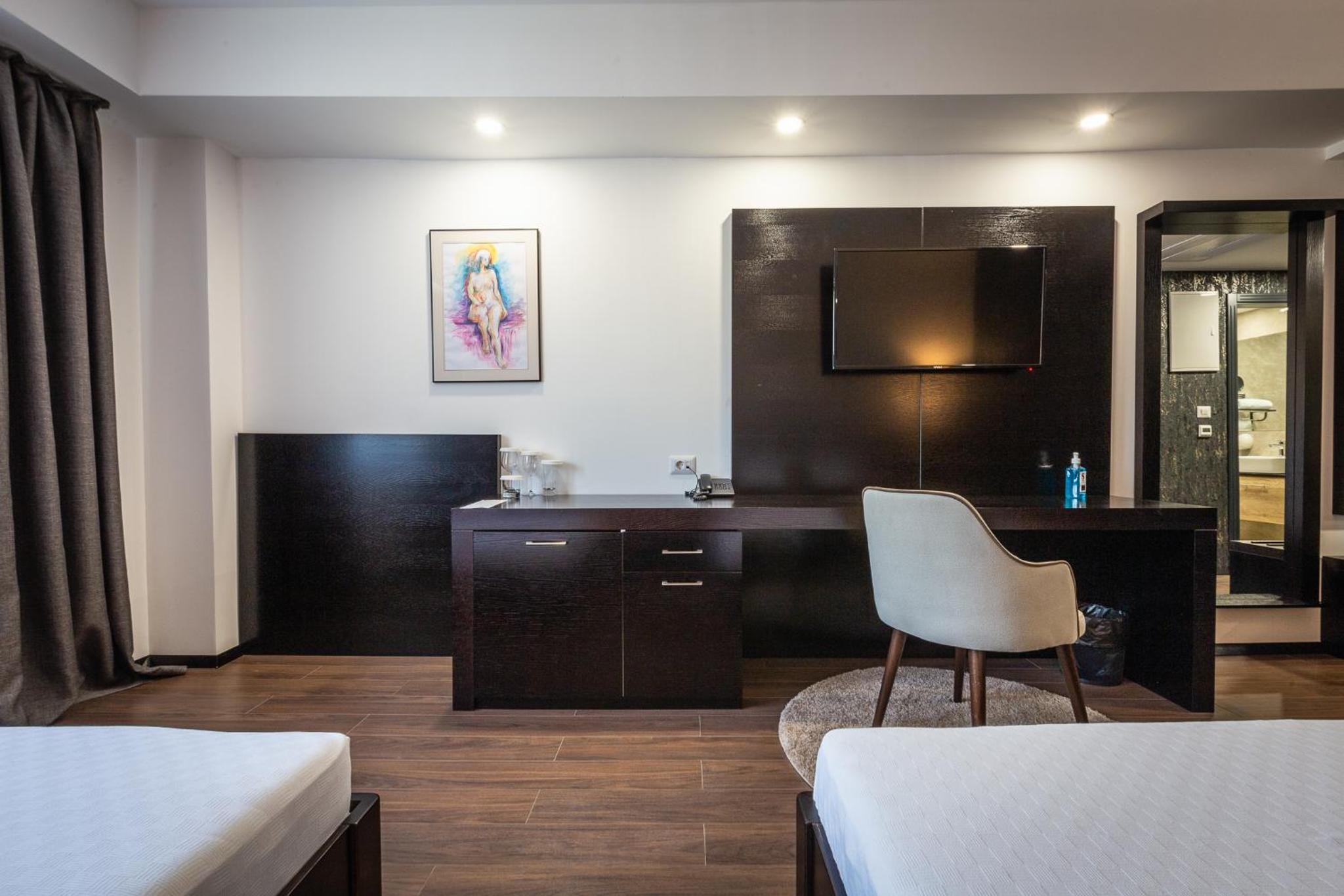 Deluxe Triple Room - Photo 1
