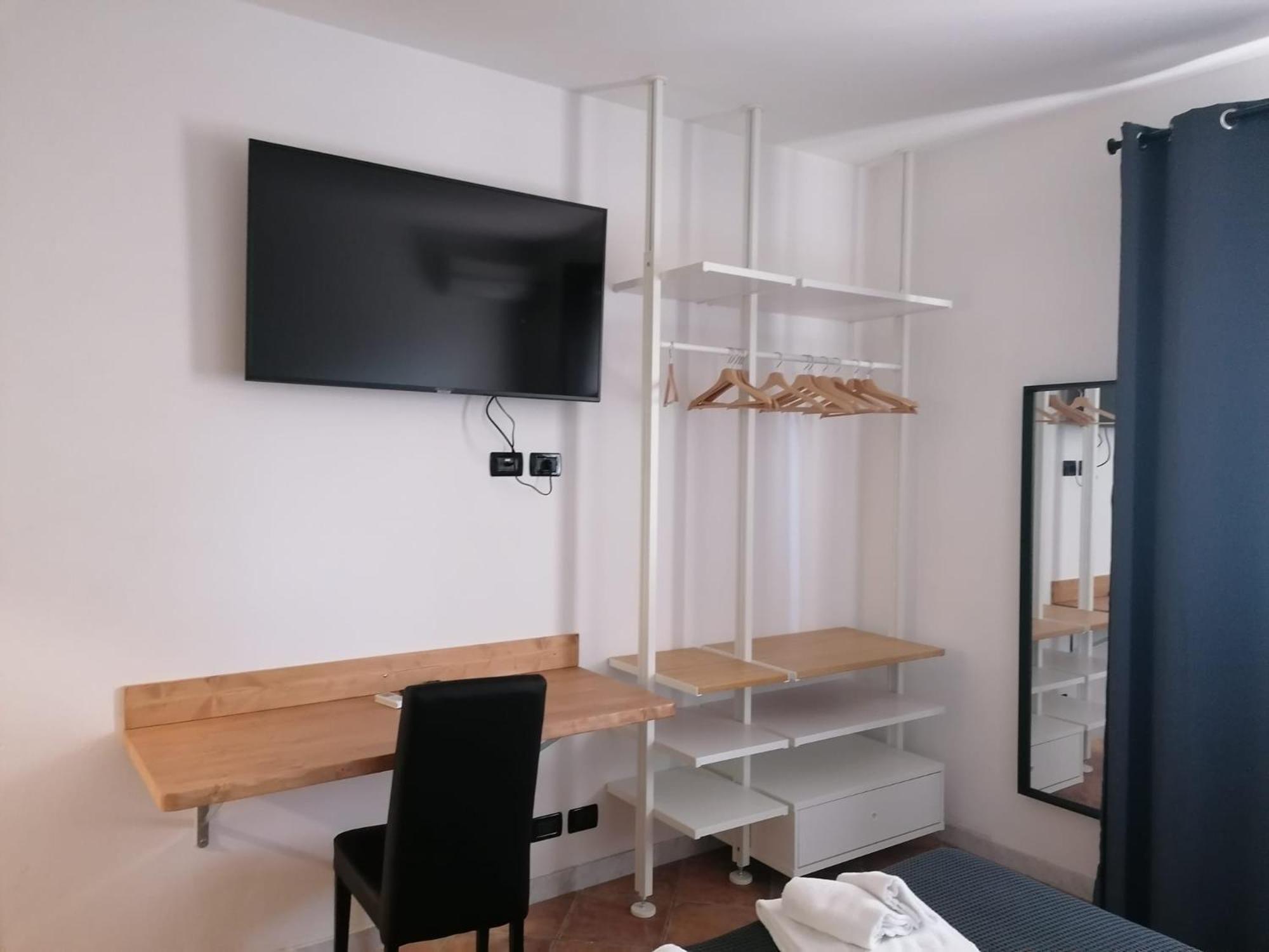 Deluxe Quadruple Room - Photo 9