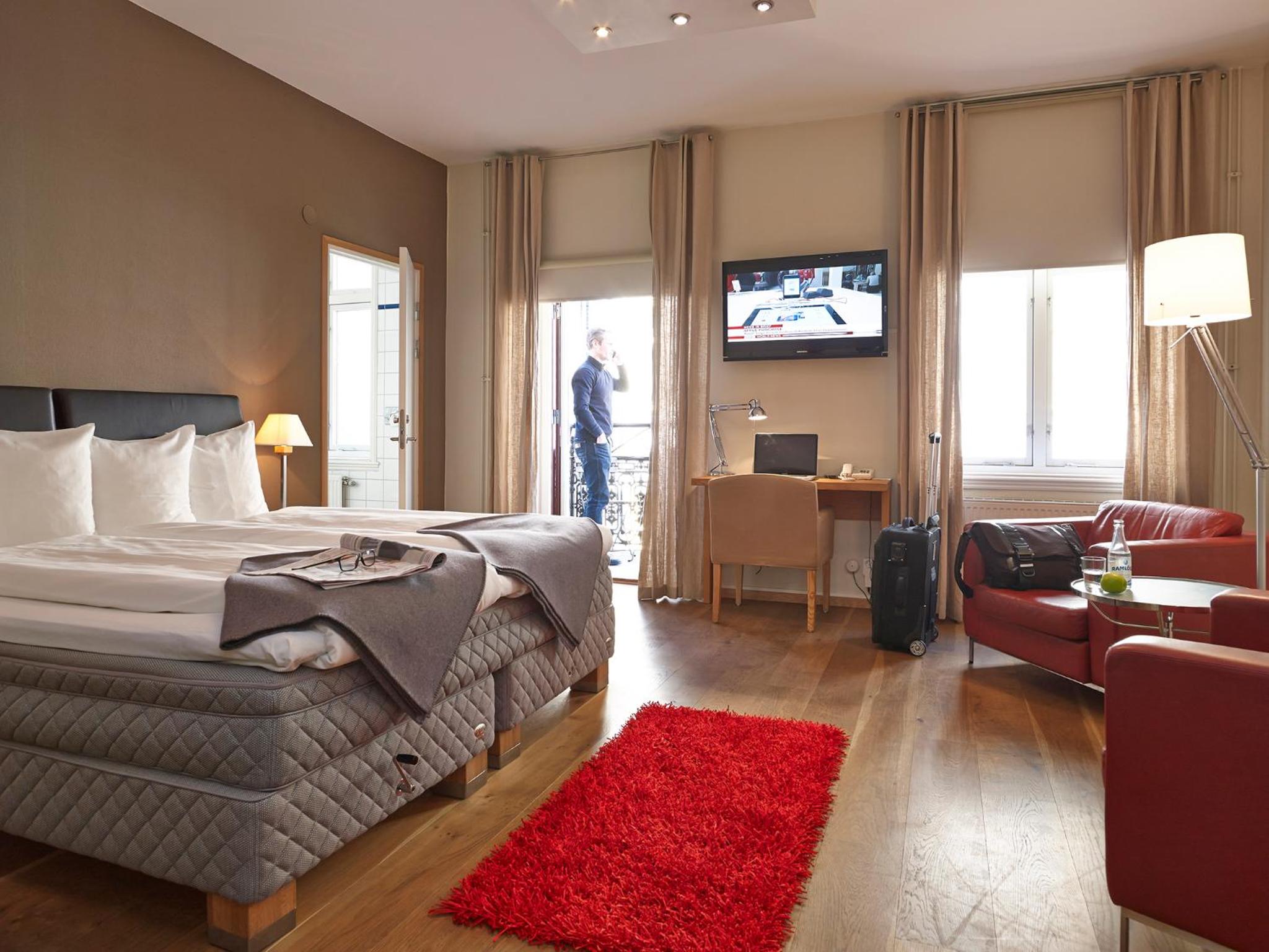 Deluxe Double King Room - Photo 10