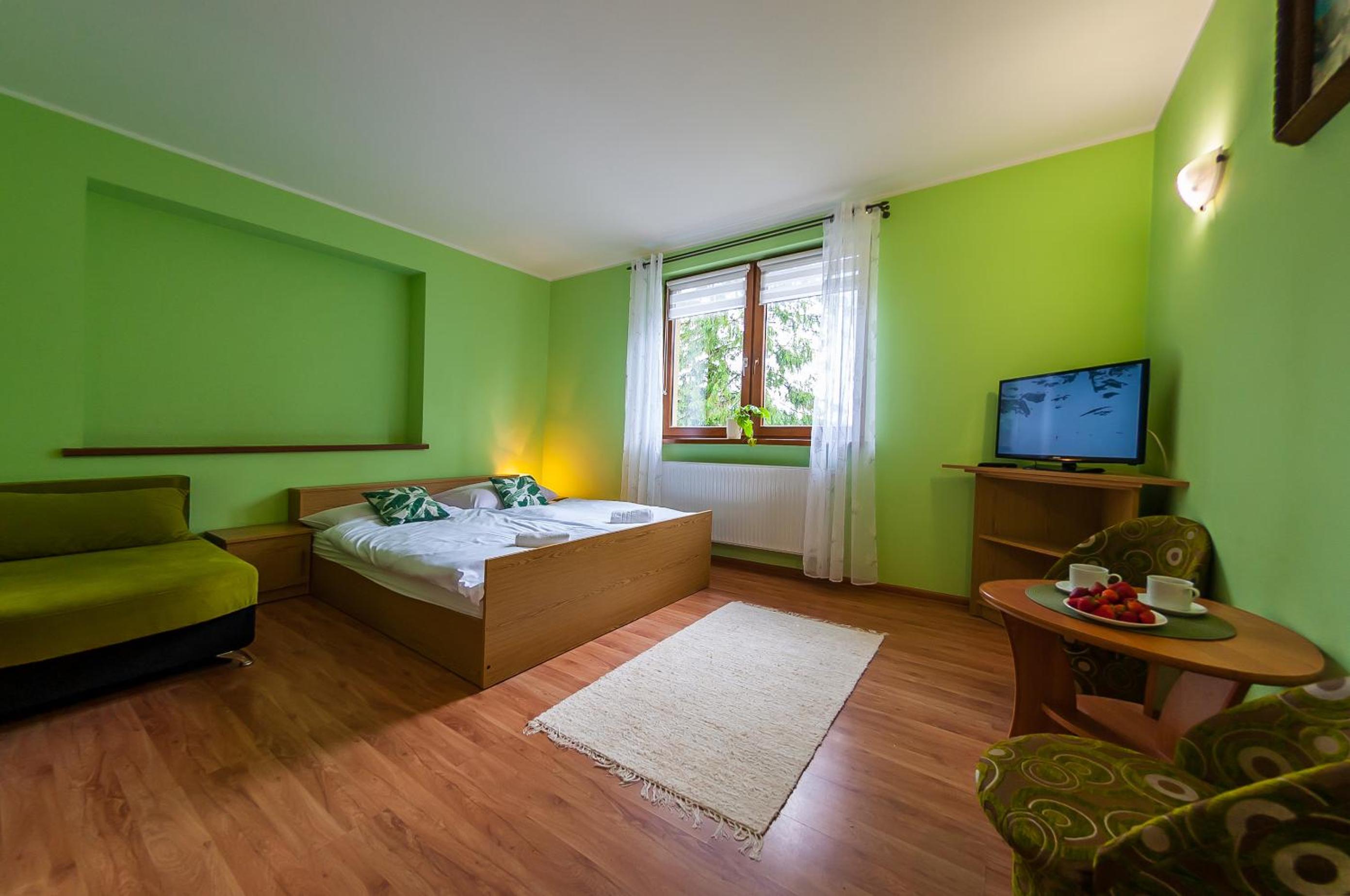Deluxe Double Room (2 Adults + 1 Child) photo 2