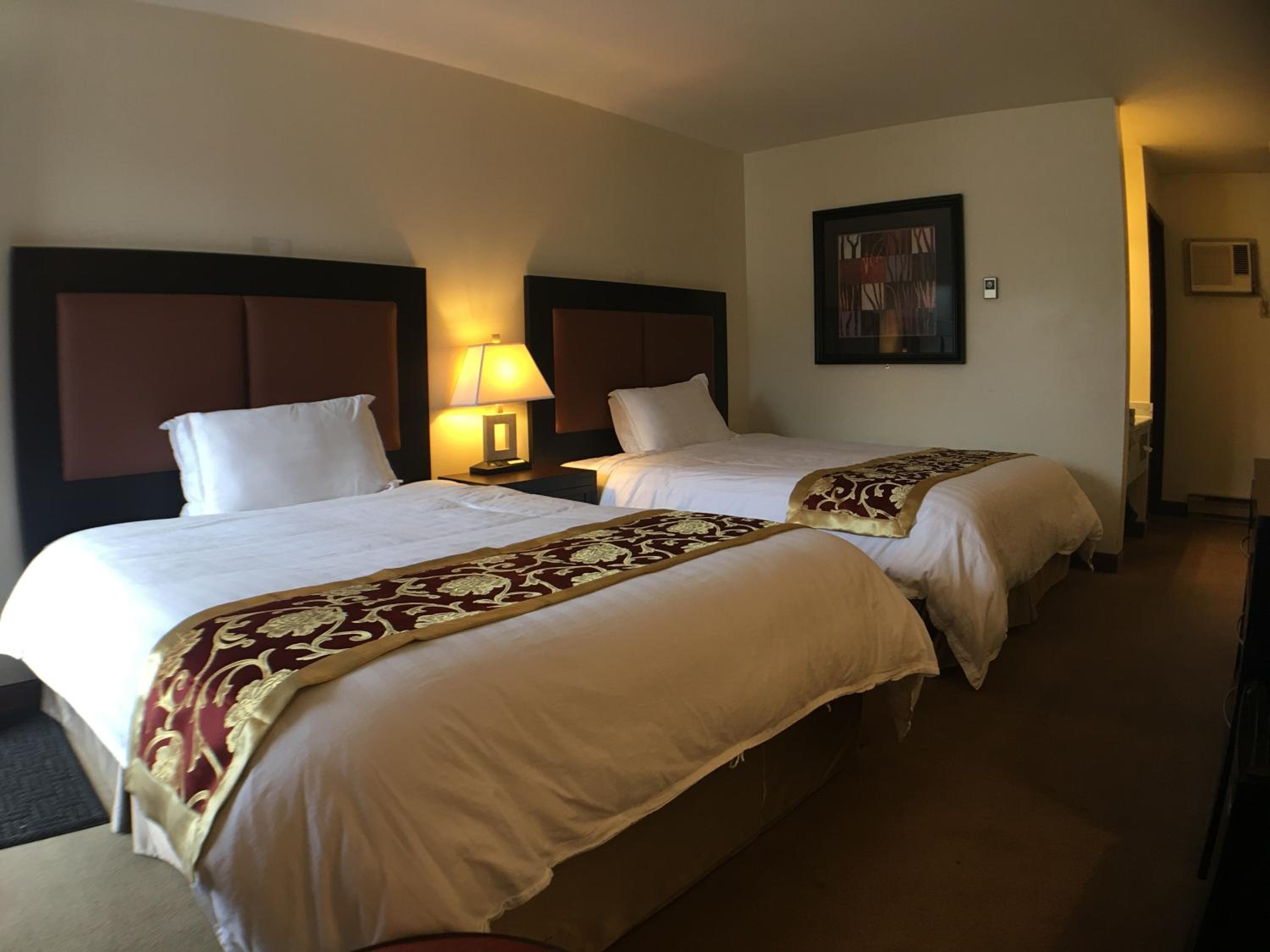 Standard Queen Room with Two Queen Beds - Photo 1