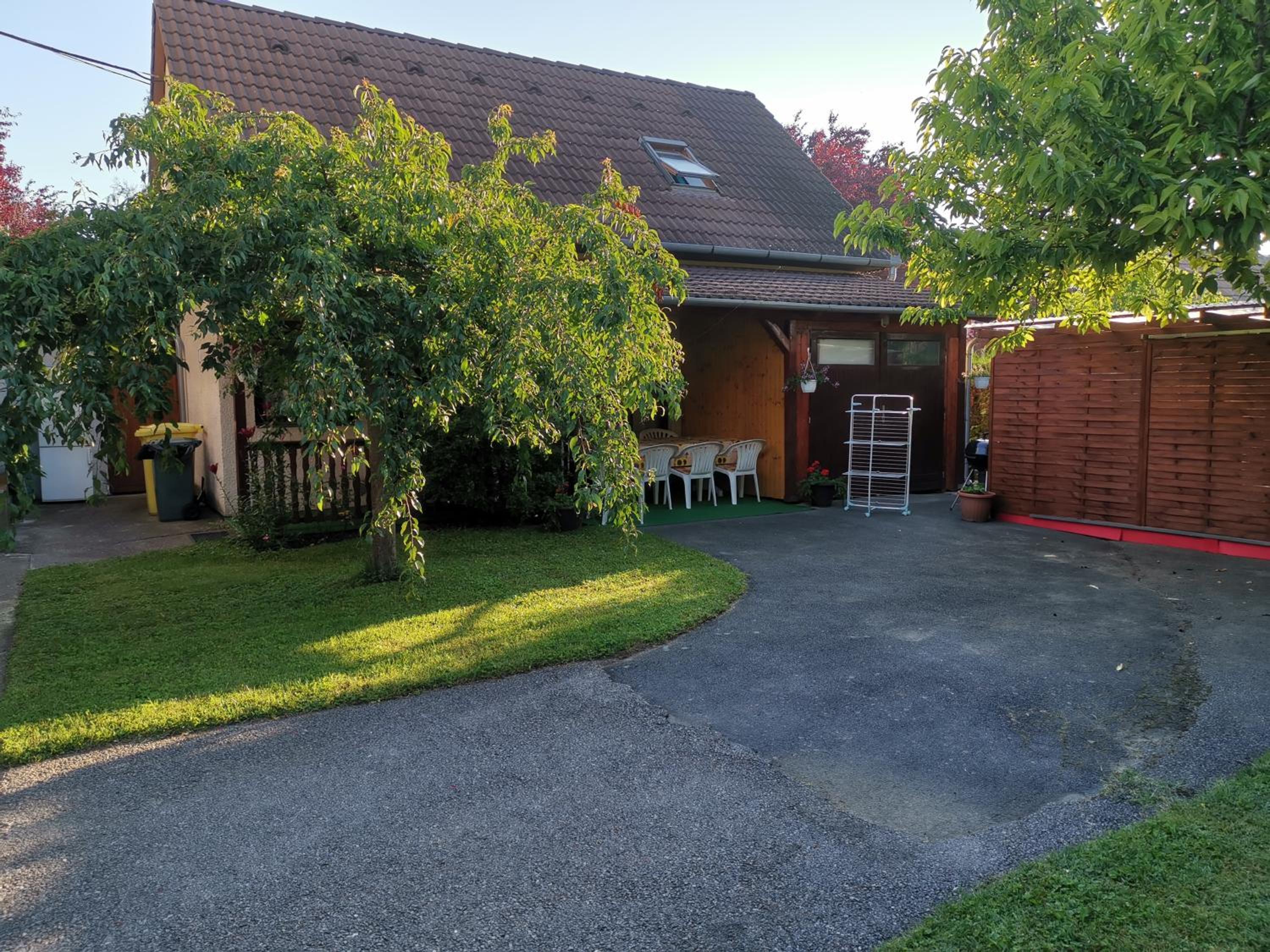 Three-Bedroom House - Photo 22