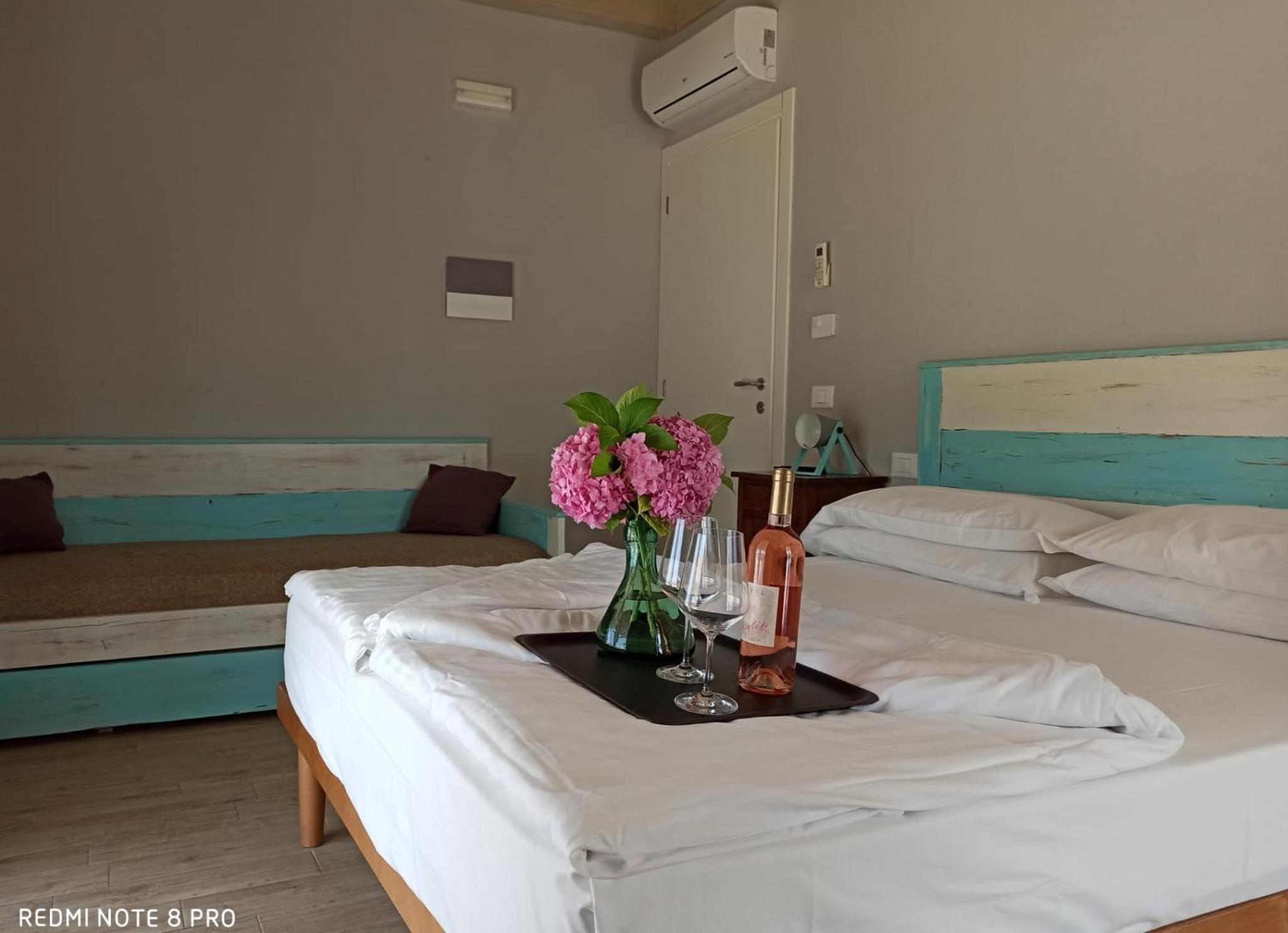 Quadruple Room with External Kitchenette and Pool view