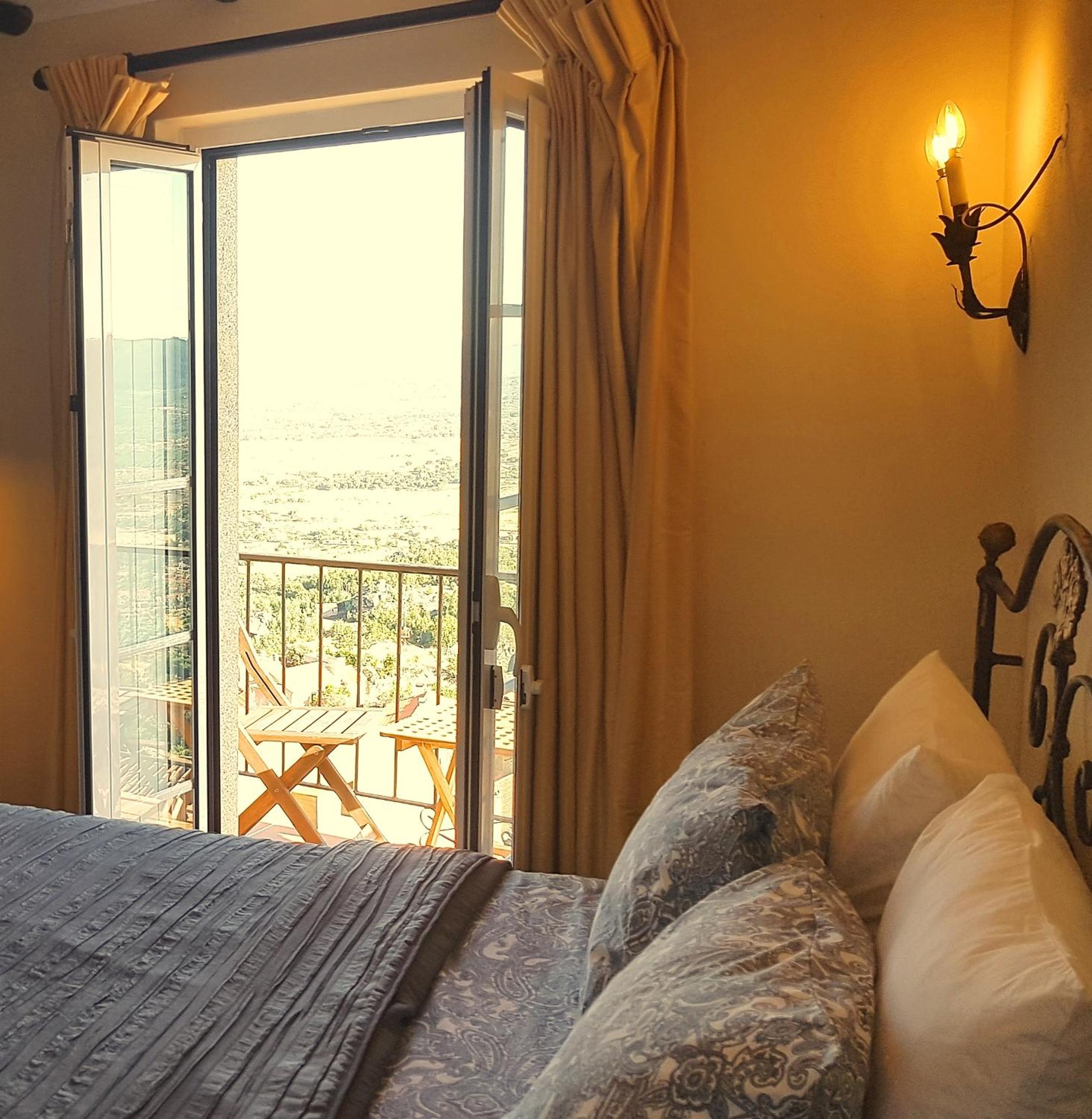 Suite Lit King-Size avec Balcon