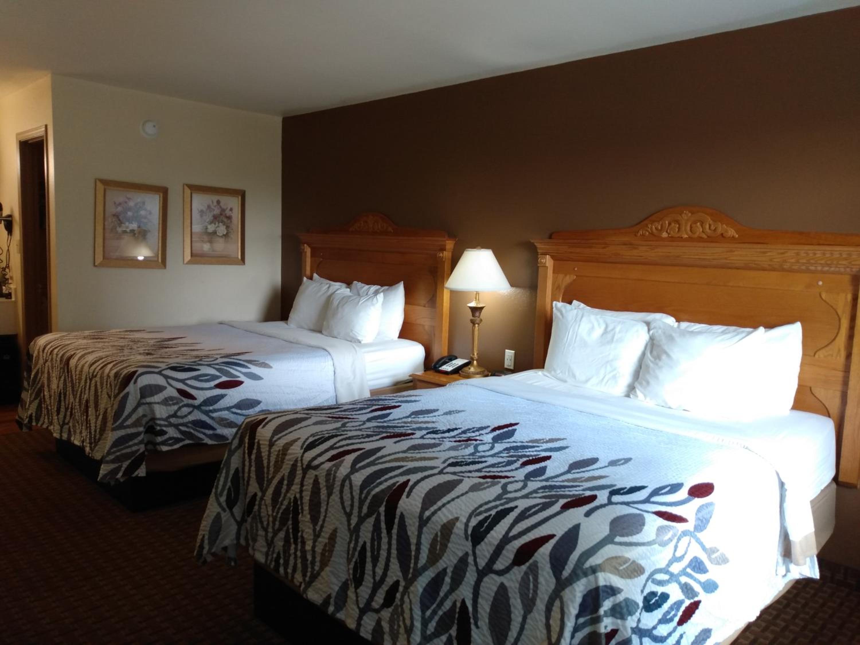 Queen Room with Two Queen Beds - Photo 1