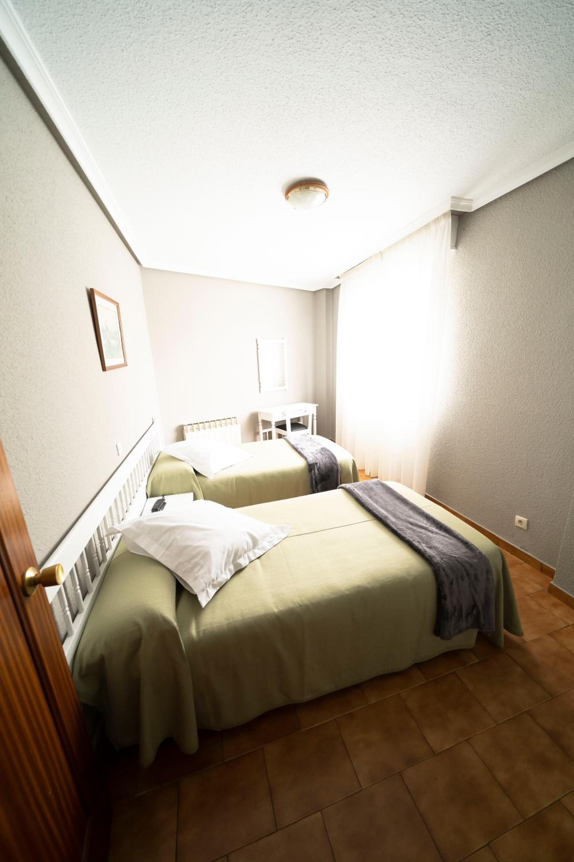 Habitación triple con terraza