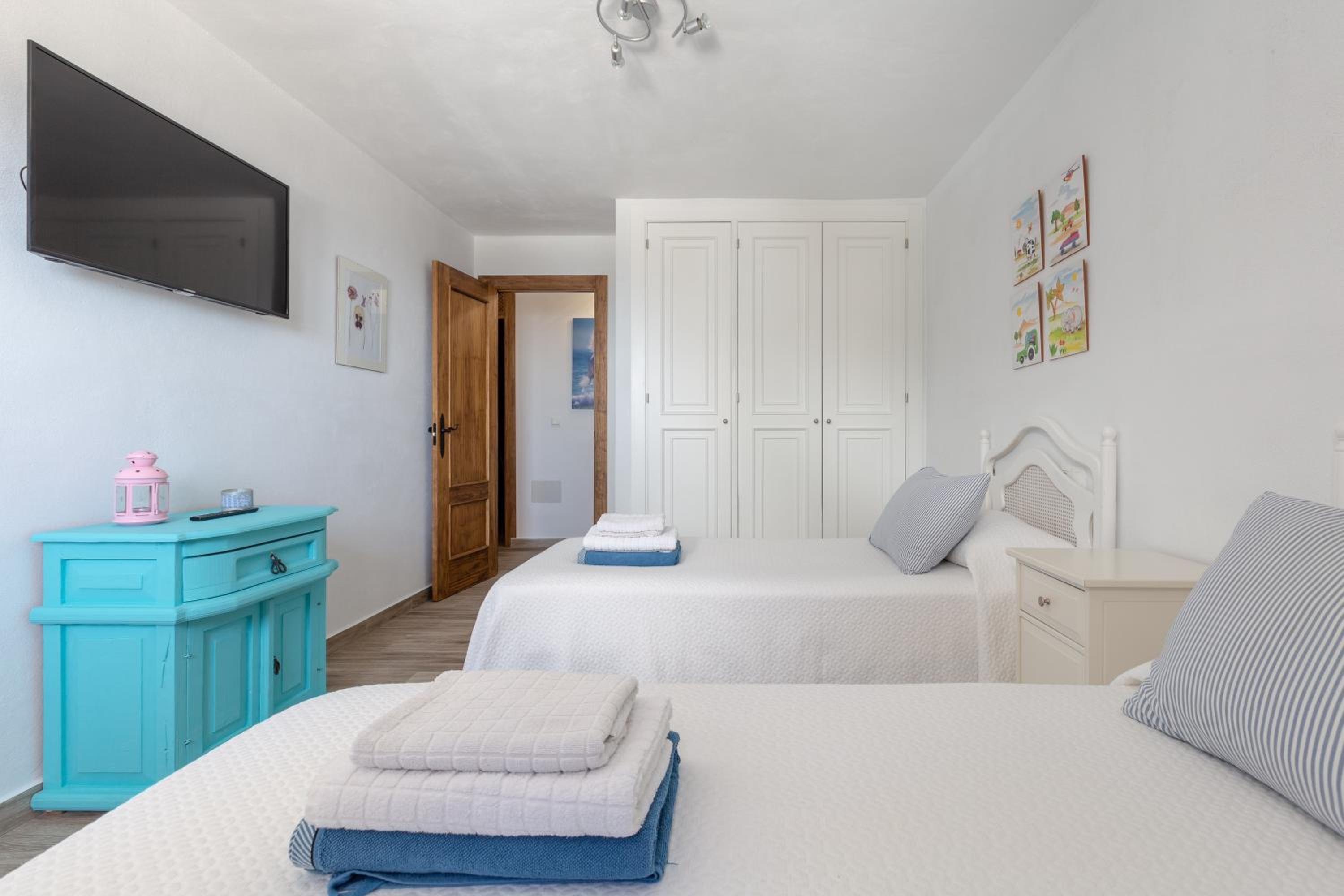 Three-Bedroom House - Photo 25