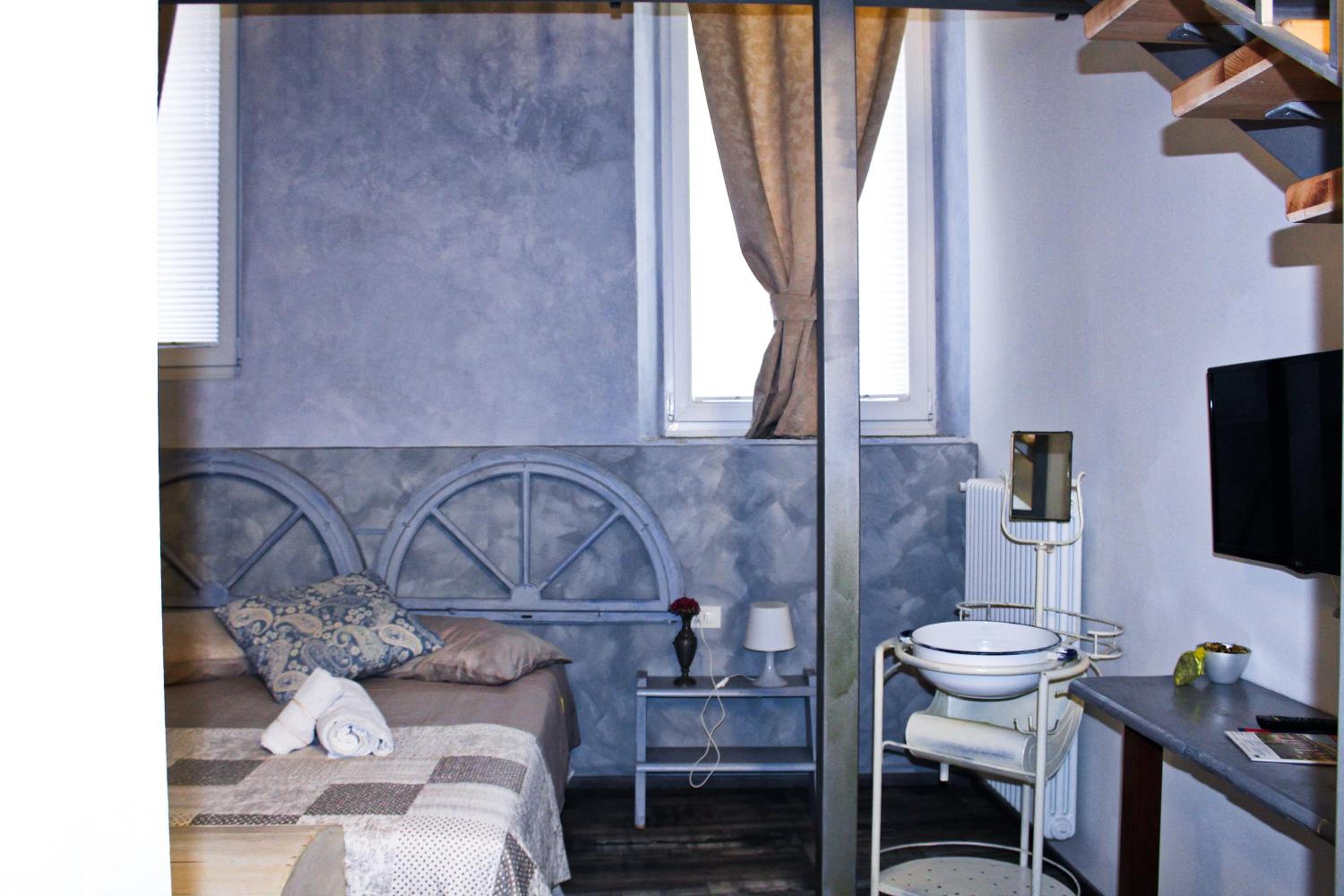 Quadruple Room with Private Bathroom - Photo 1