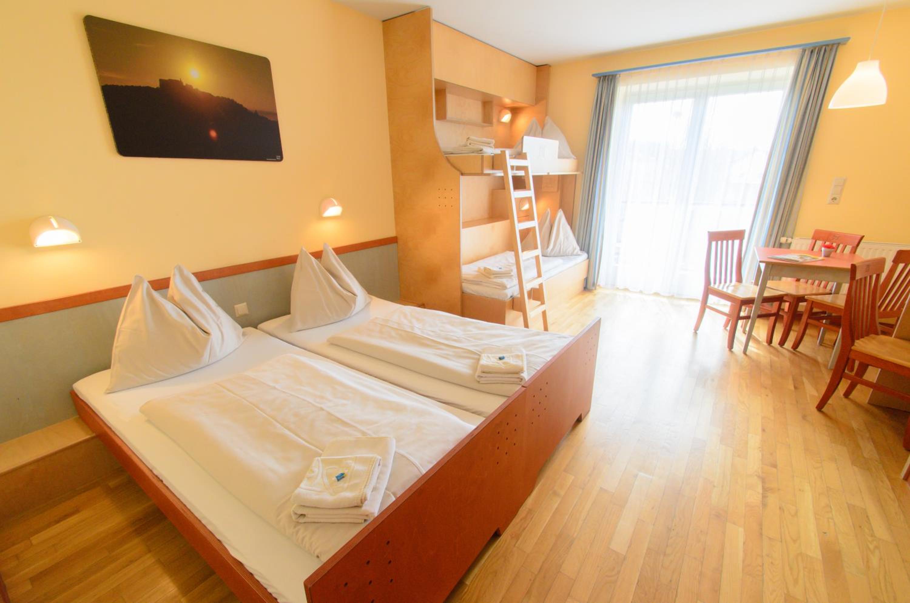 Quadruple Room with Balcony - Photo 1