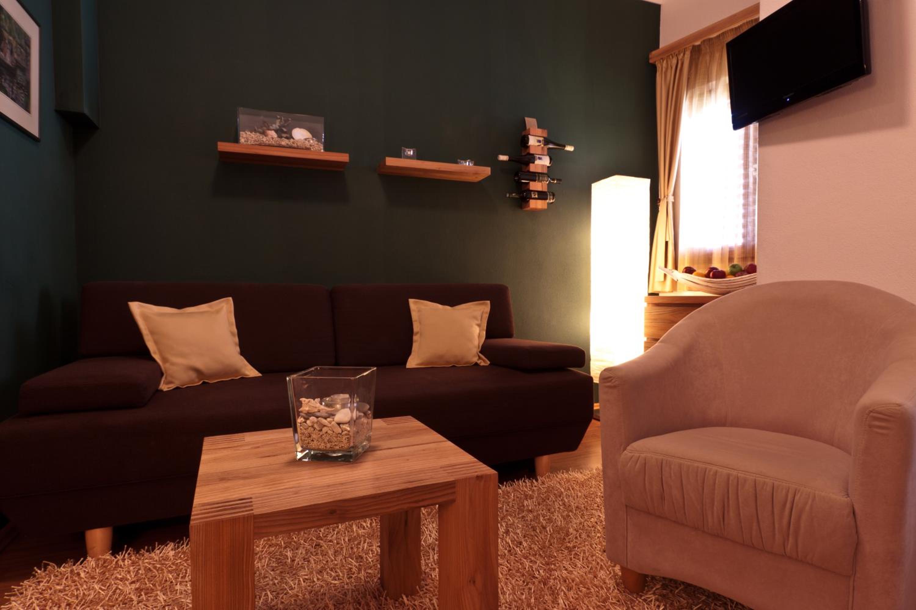 Family Room with Small Balcony and Street View photo 2