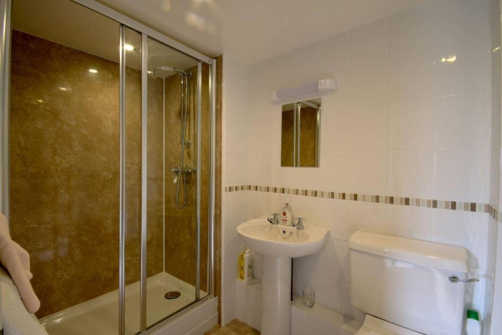 Three-Bedroom House - Photo 17