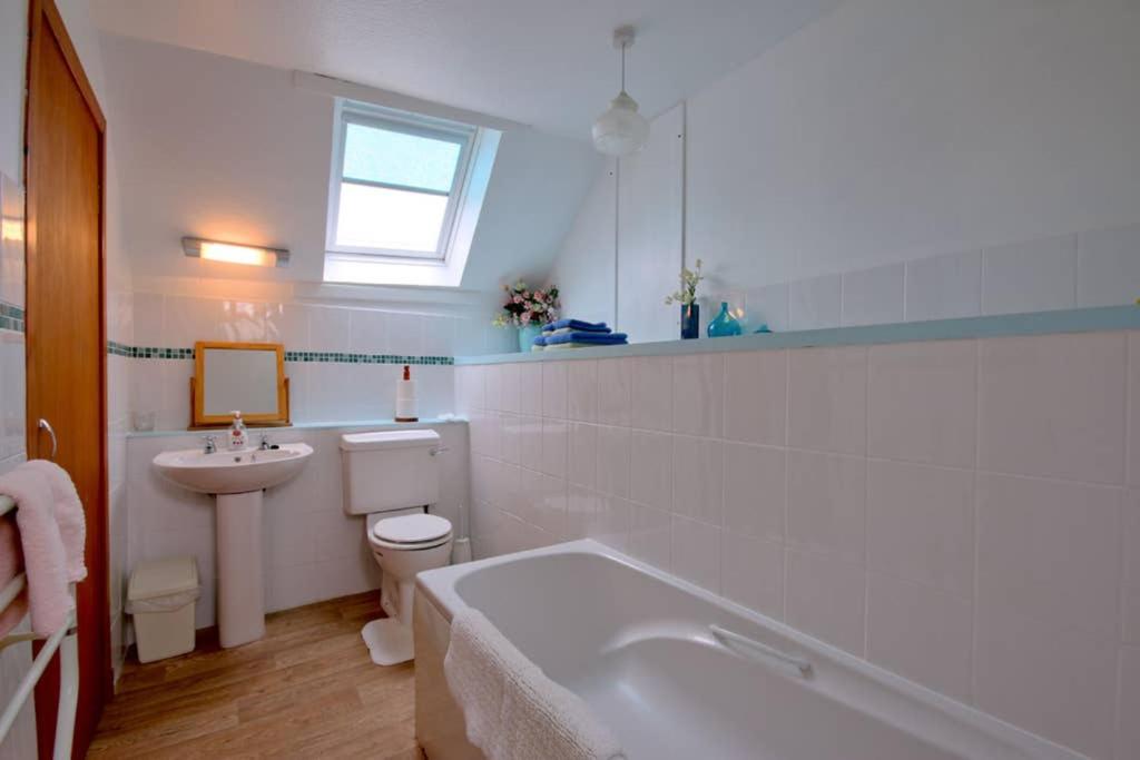 Three-Bedroom House - Photo 18