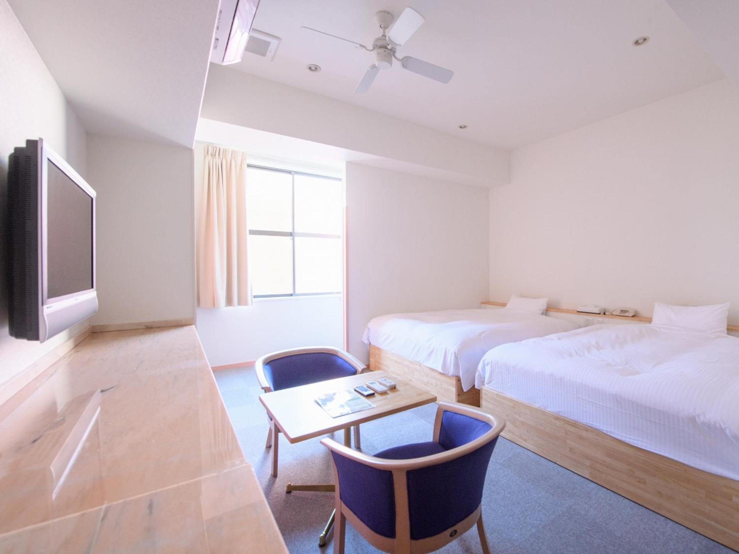 Twin Room with Two Queen Beds - Non-Smoking