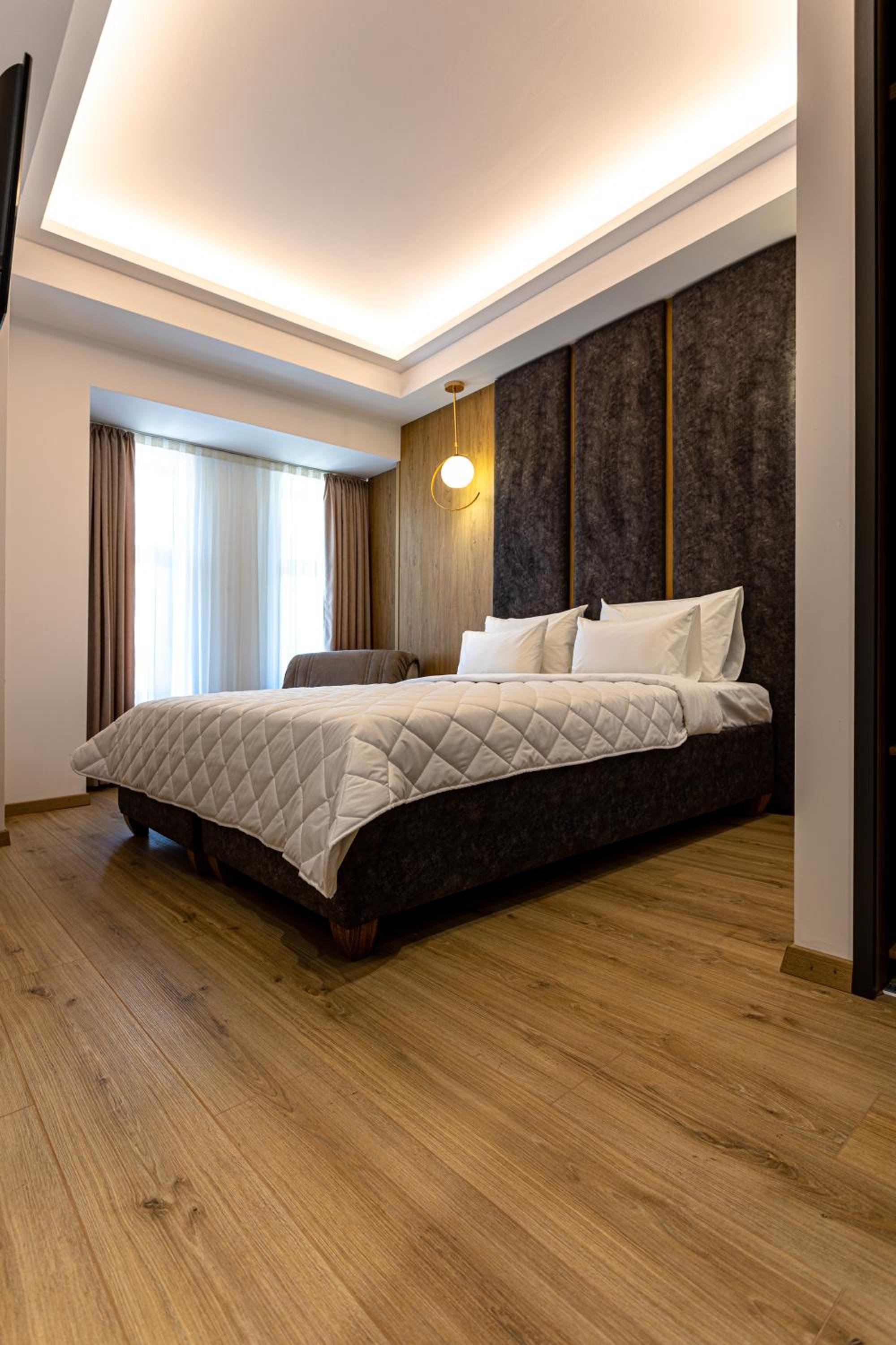 Deluxe Triple Room - Photo 1