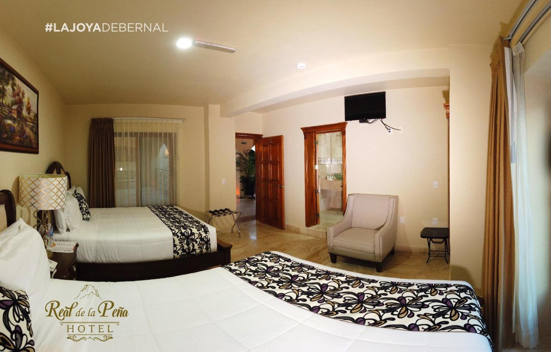 Deluxe Queen Room with Two Queen Beds - Photo 1