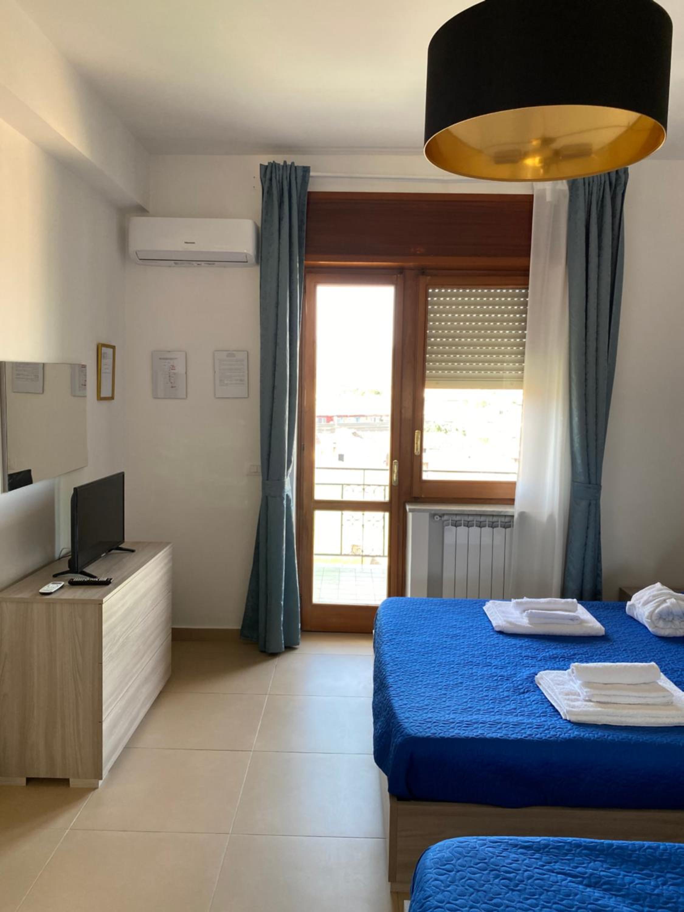 Quadruple Room with Private Bathroom