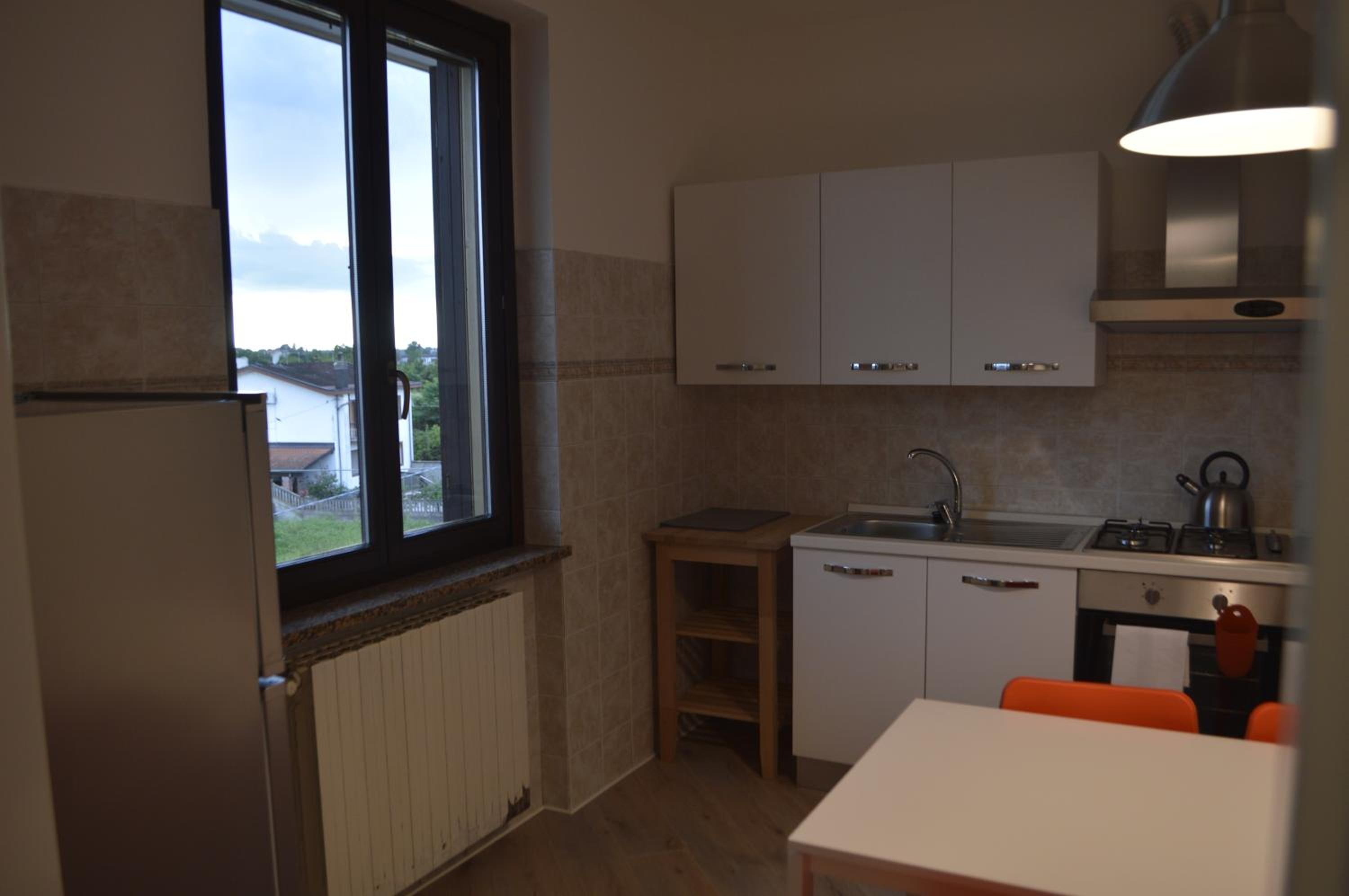 Three-Bedroom Apartment - Photo 2