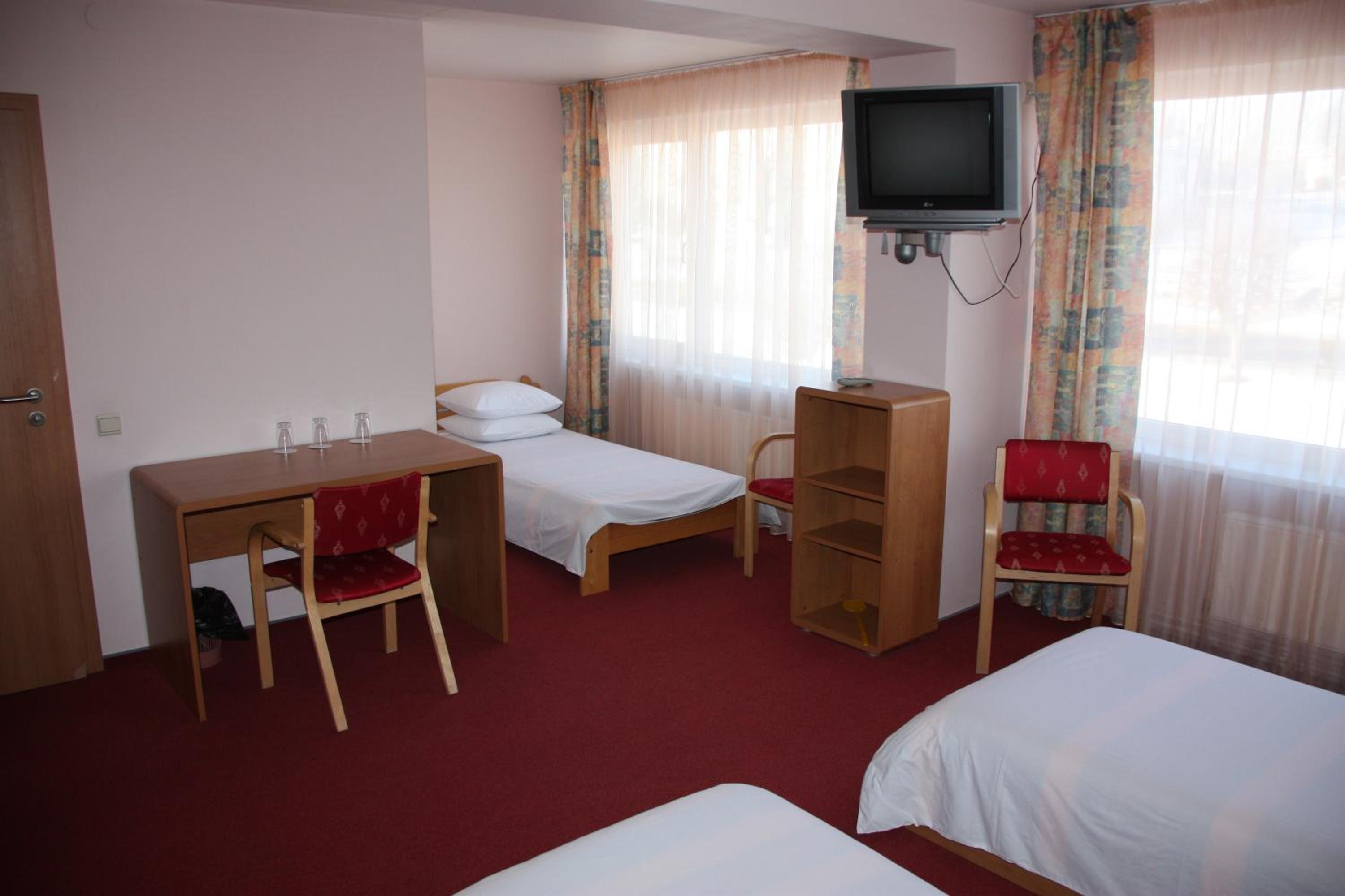 Triple Room - Photo 1
