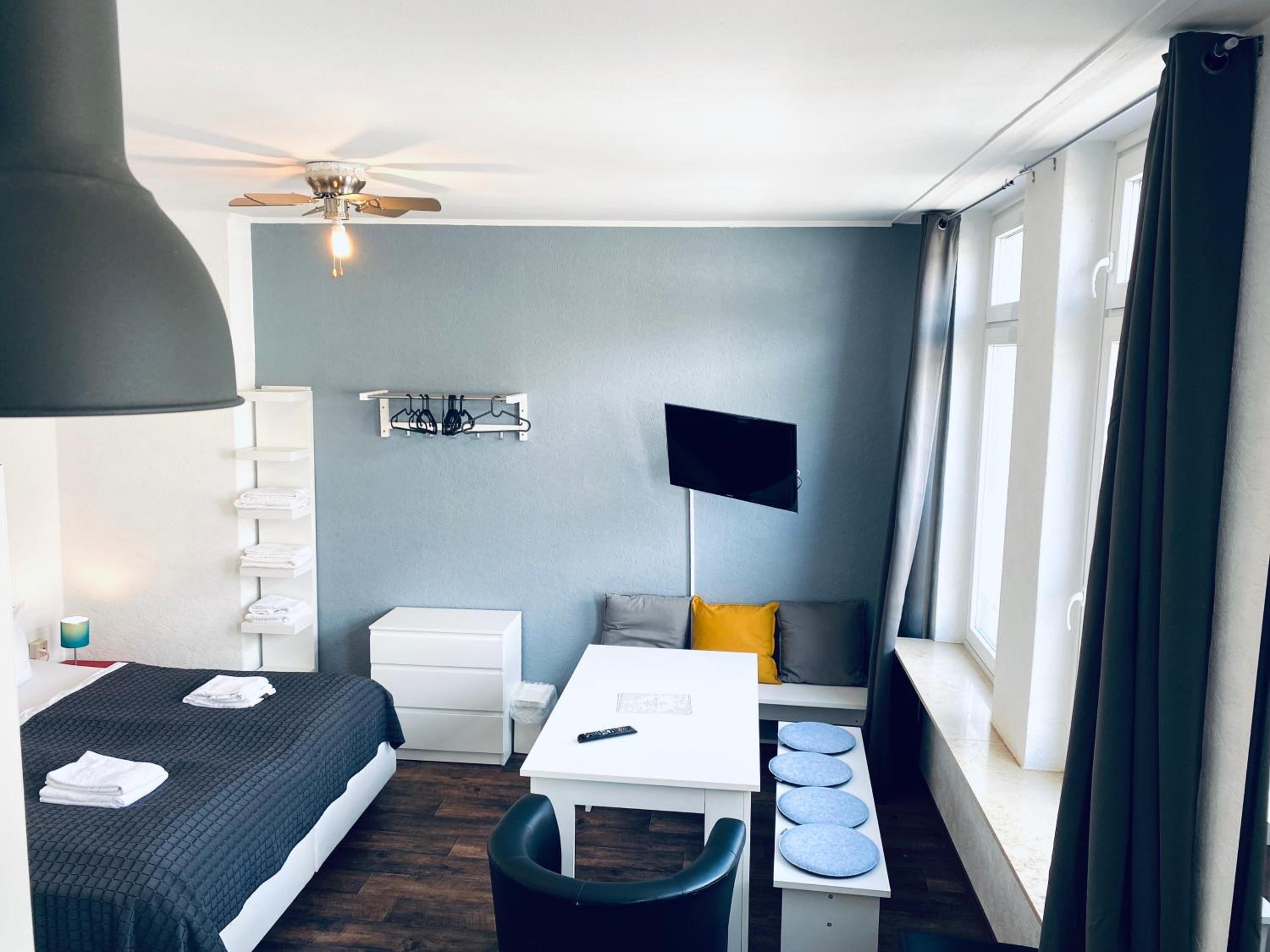 Studio with Shared Bathroom (max. 4 Adults)
