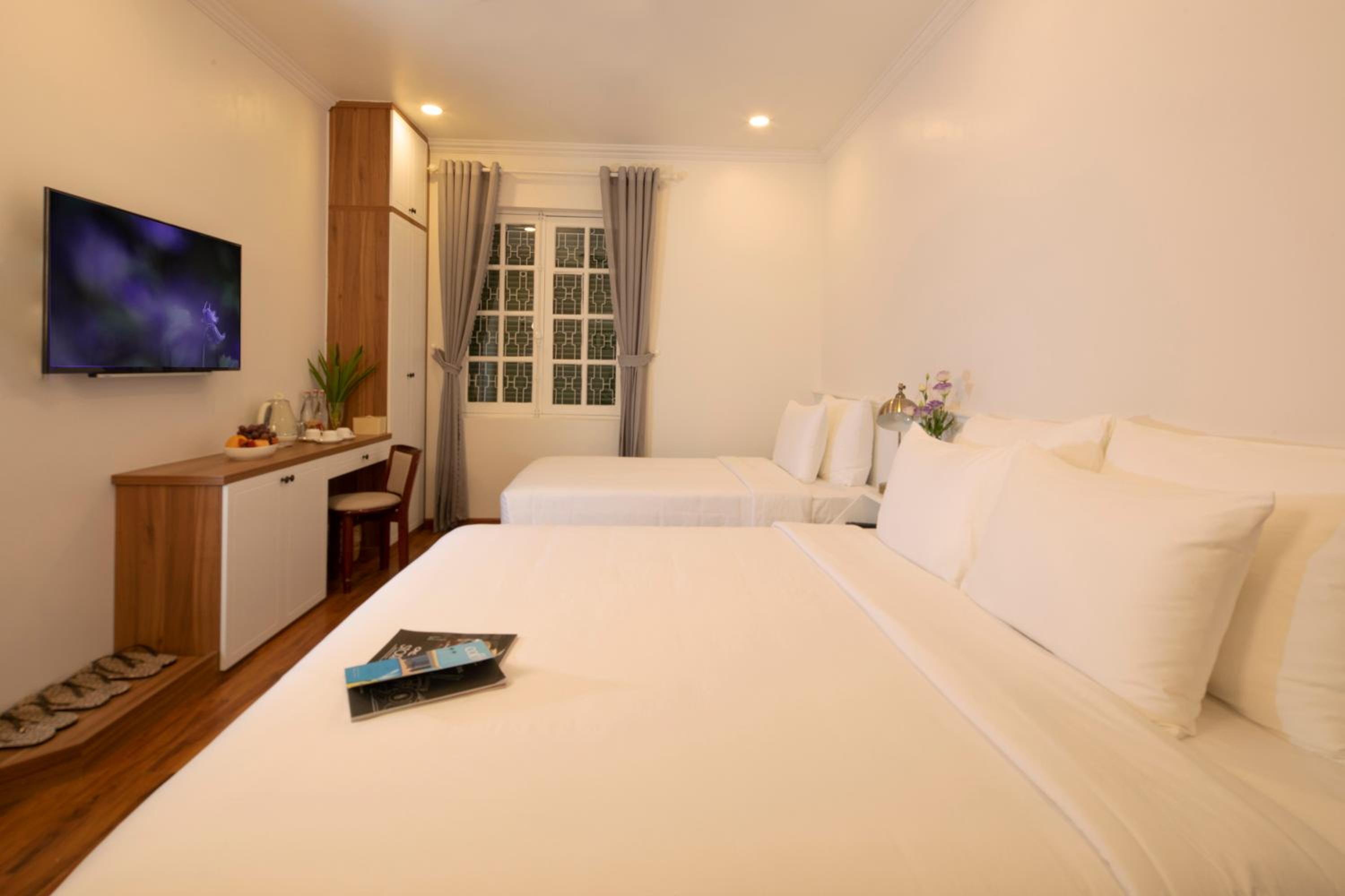 Deluxe Triple Room - Photo 23