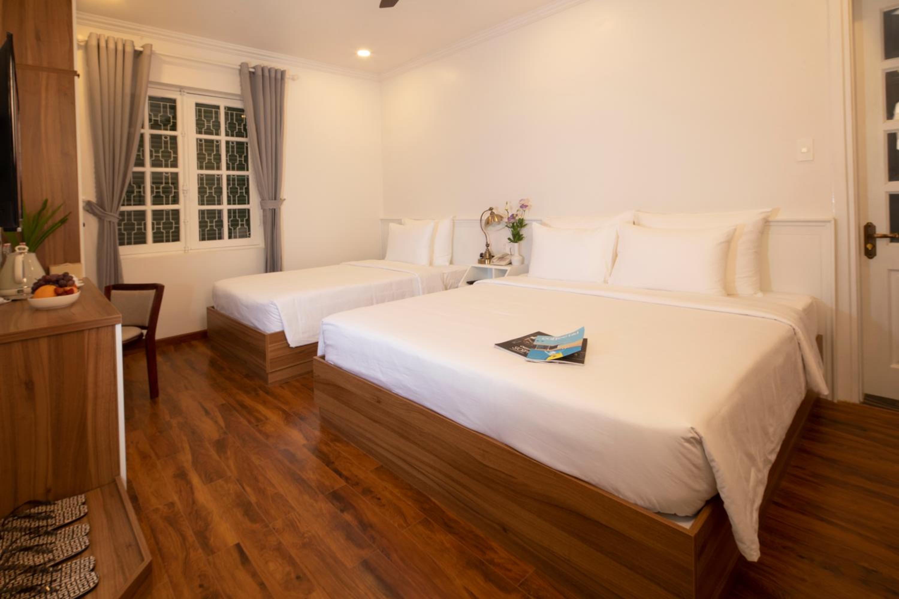 Deluxe Triple Room - Photo 22