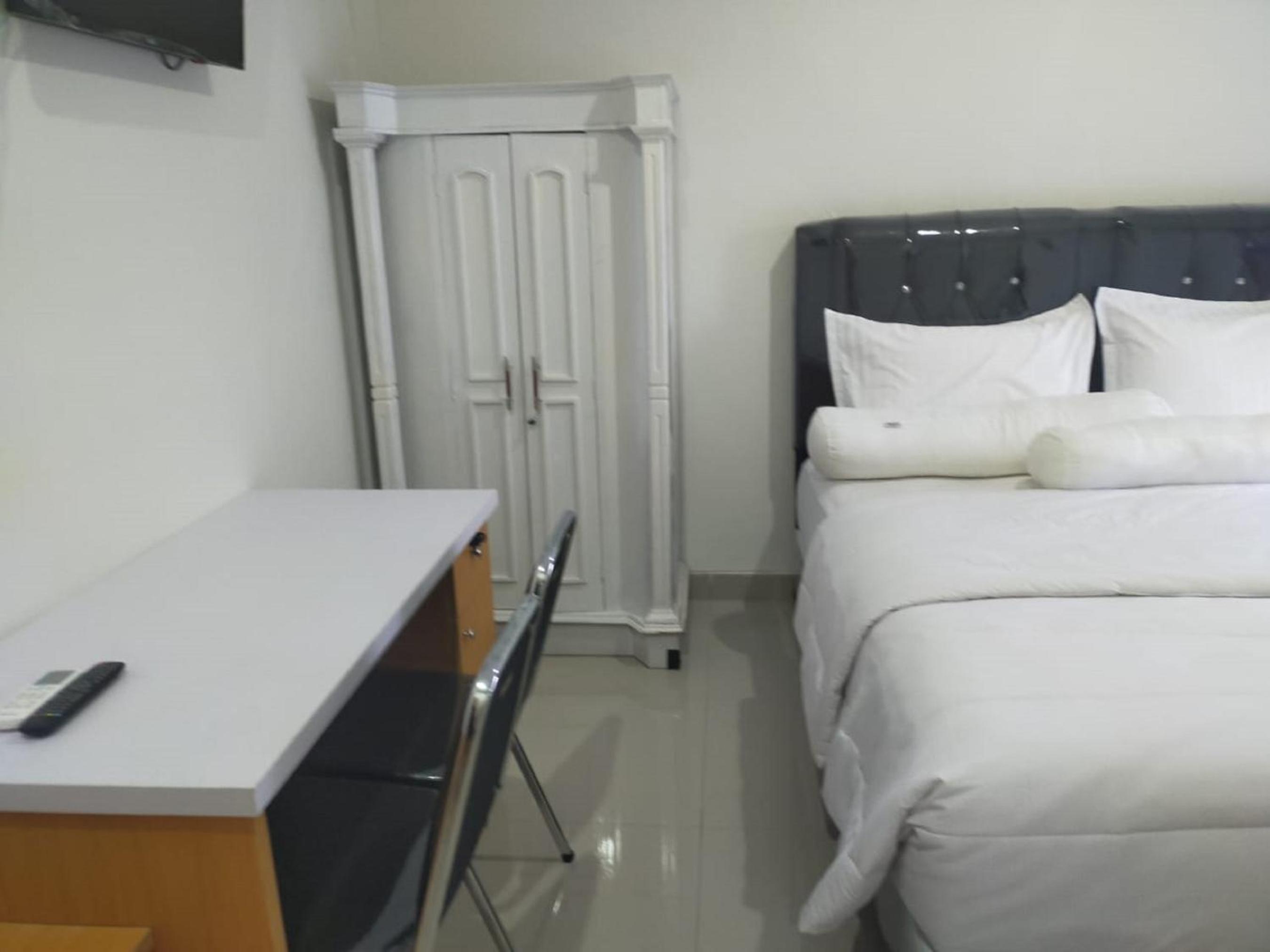 Deluxe Room - Photo 3