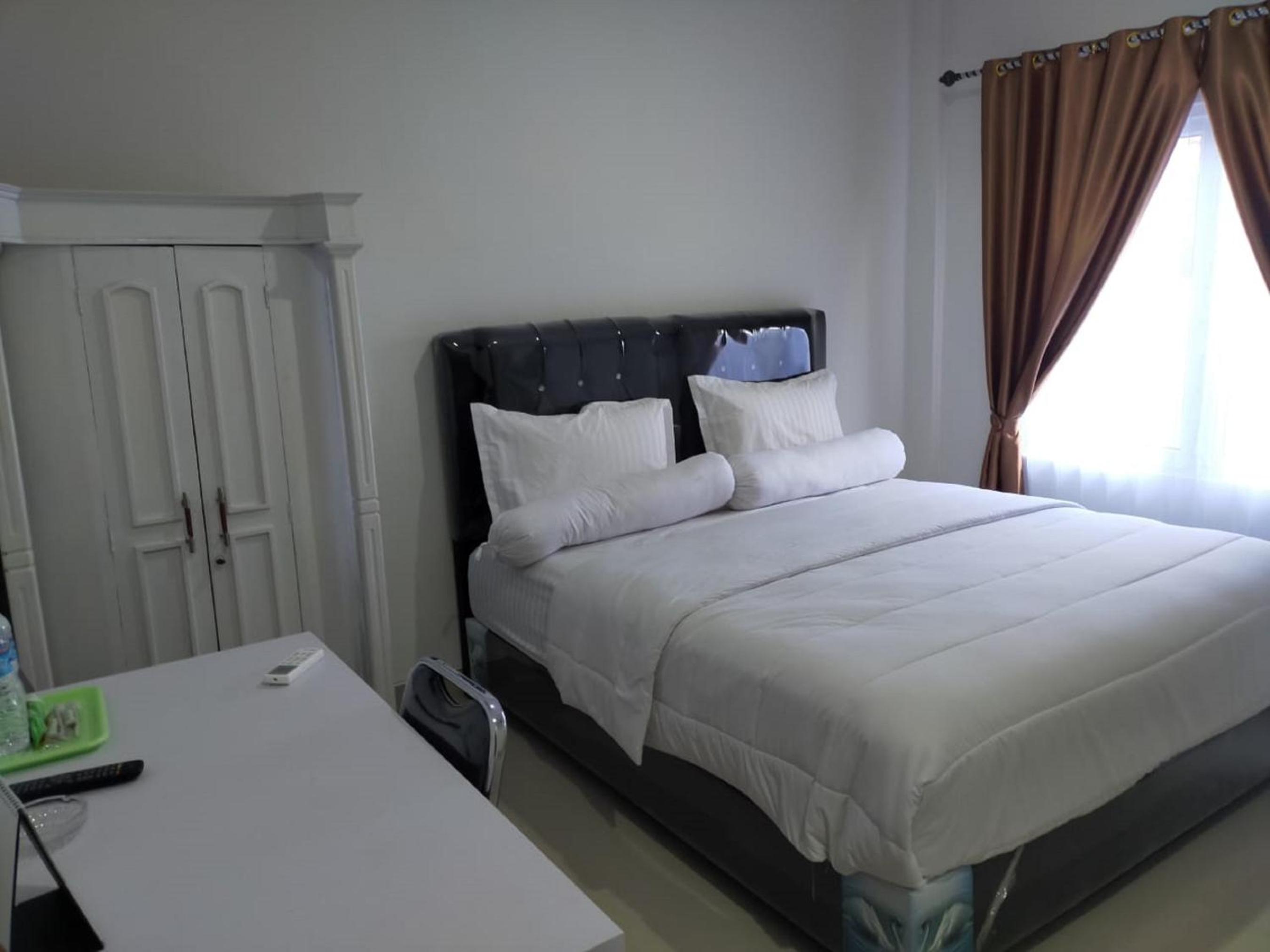 Deluxe Room - Photo 4