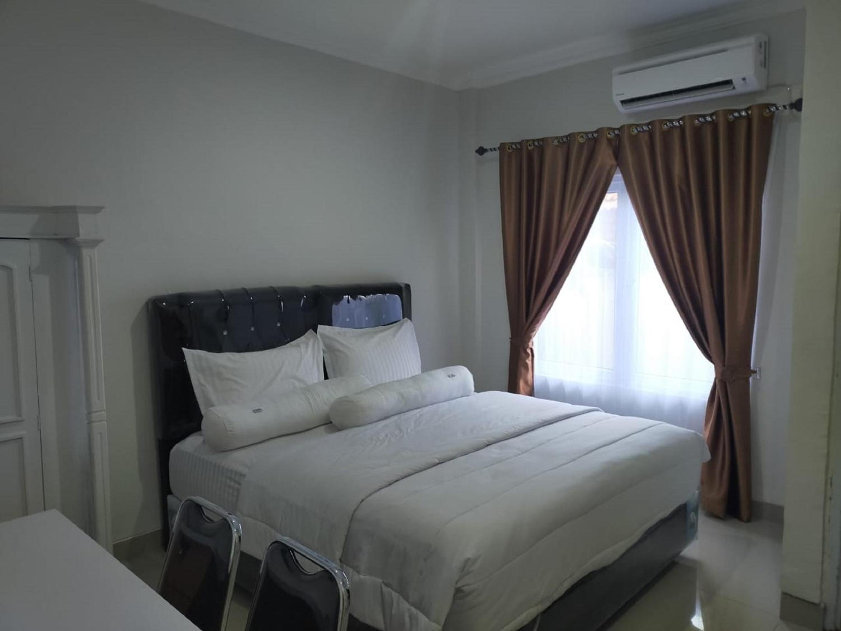Deluxe Room - Photo 1