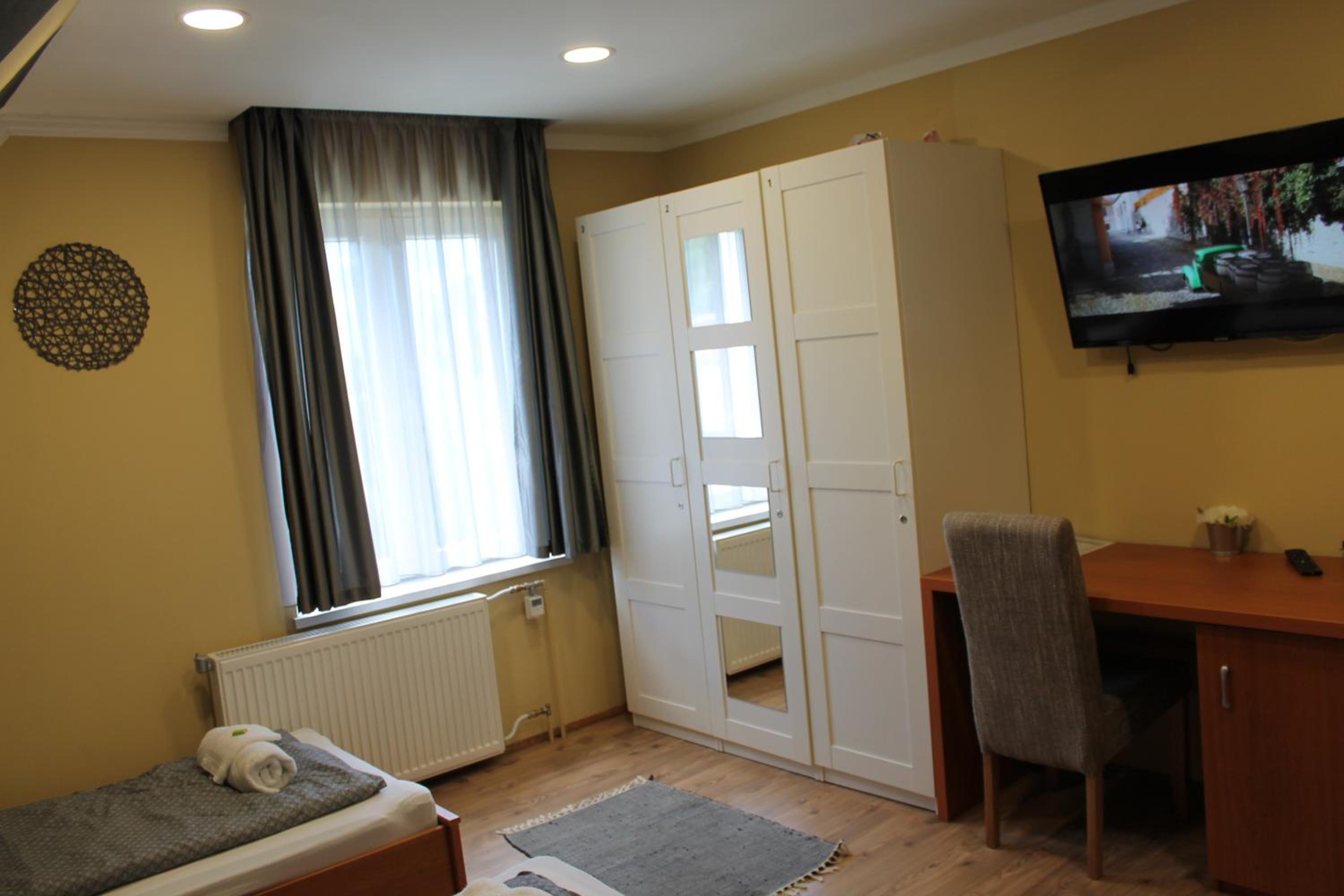Three-Bedroom Apartment - Photo 70