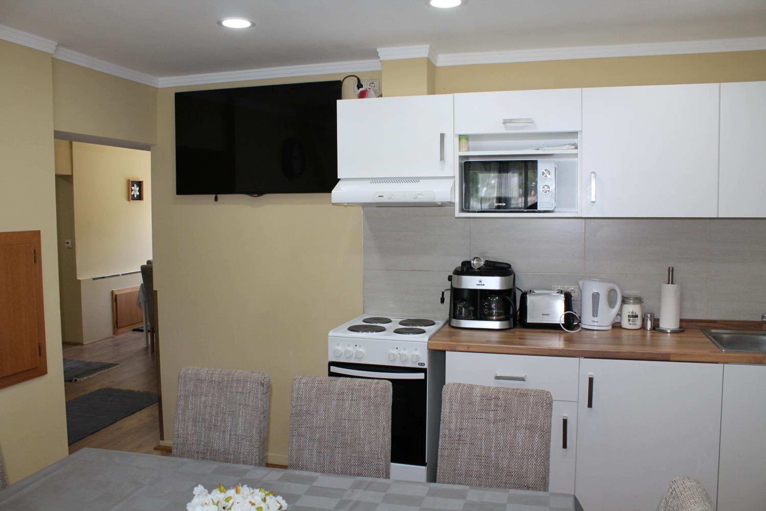 Three-Bedroom Apartment - Photo 65