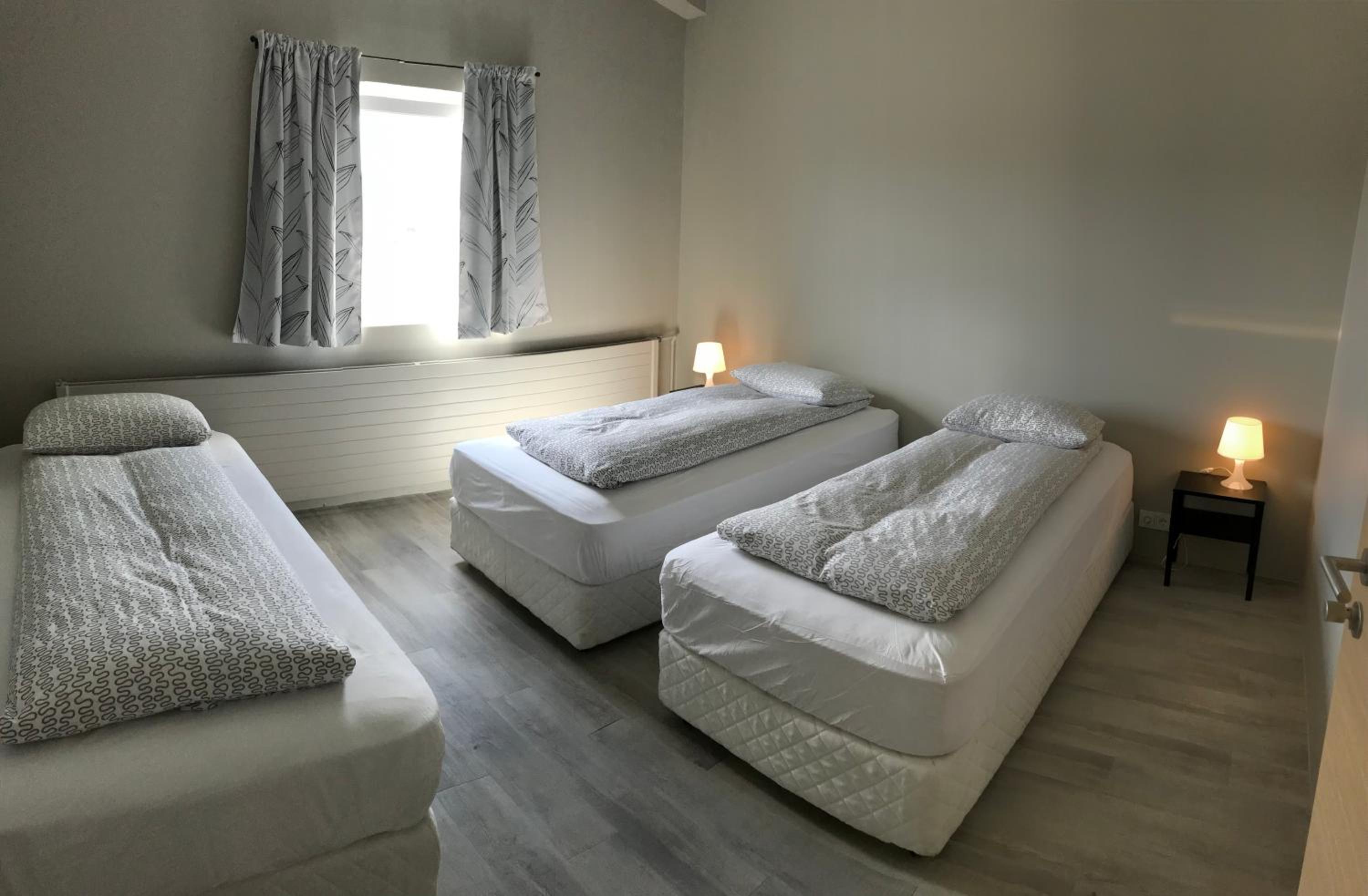 Basic Triple Room With Shared Bathroom photo 1
