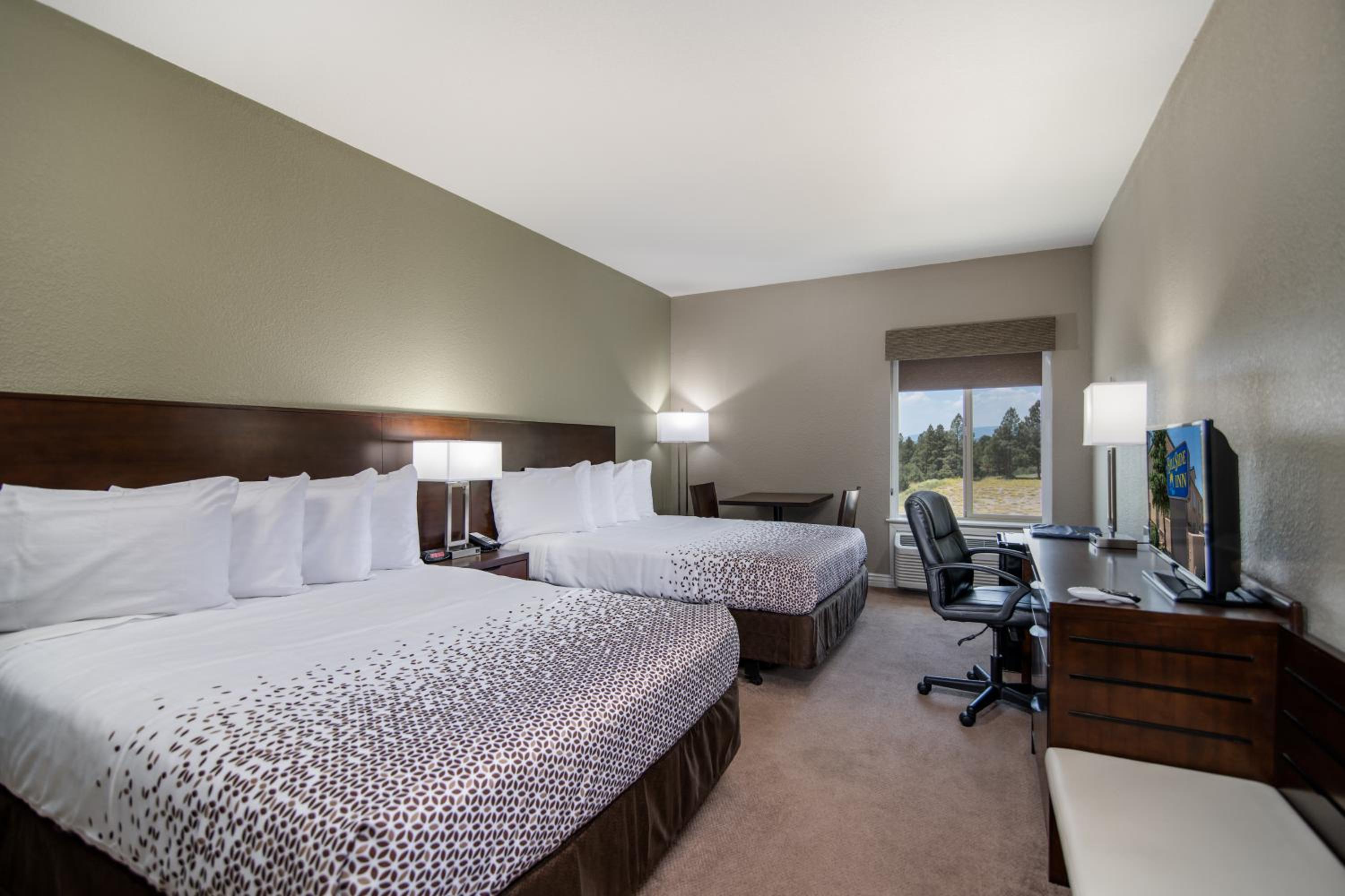 Queen Room with Two Queen Beds - Photo 1