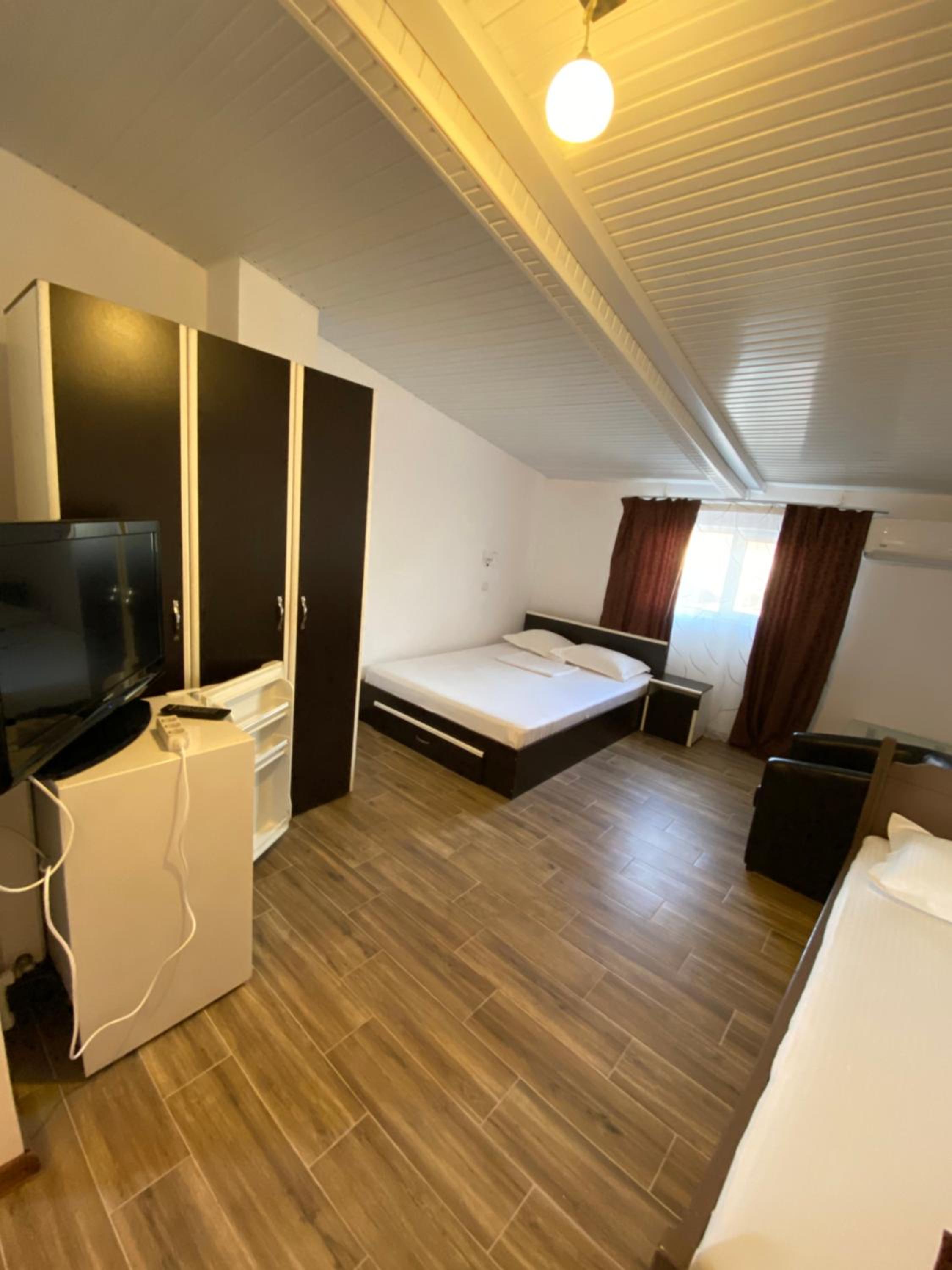 Quadruple Room with Private Bathroom