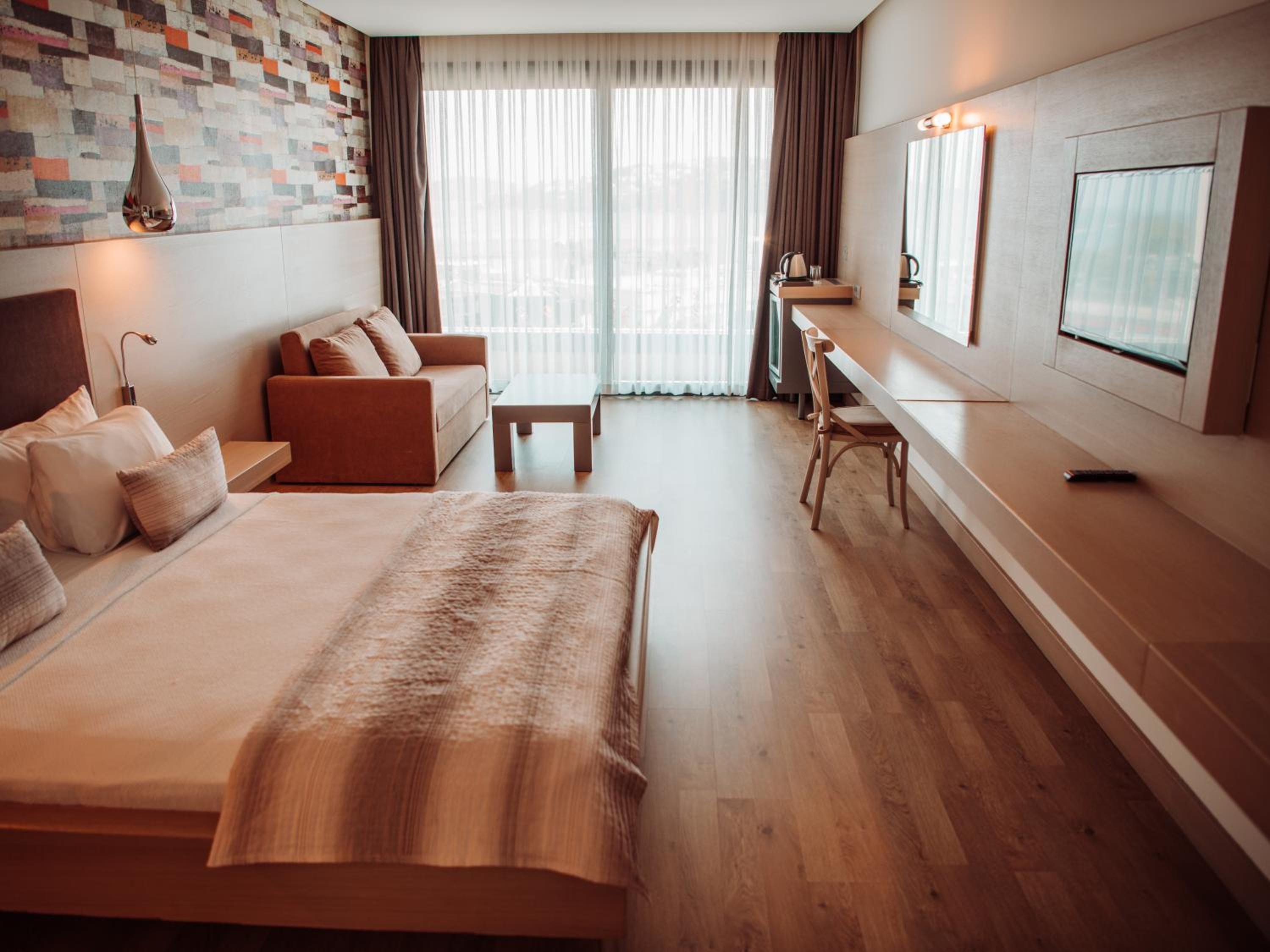 Deluxe Room - Photo 1