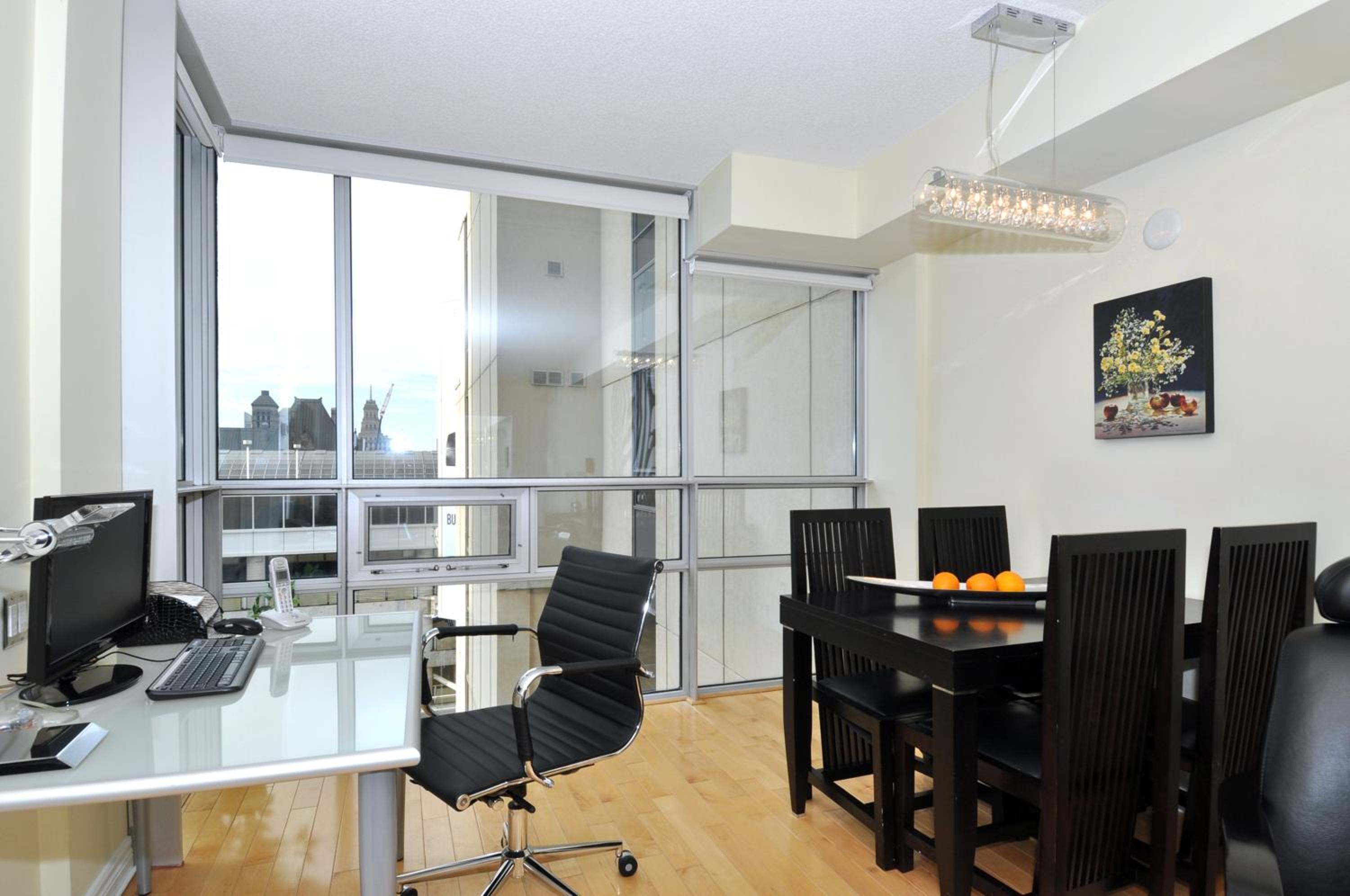 One-Bedroom Apartment with Partial City View