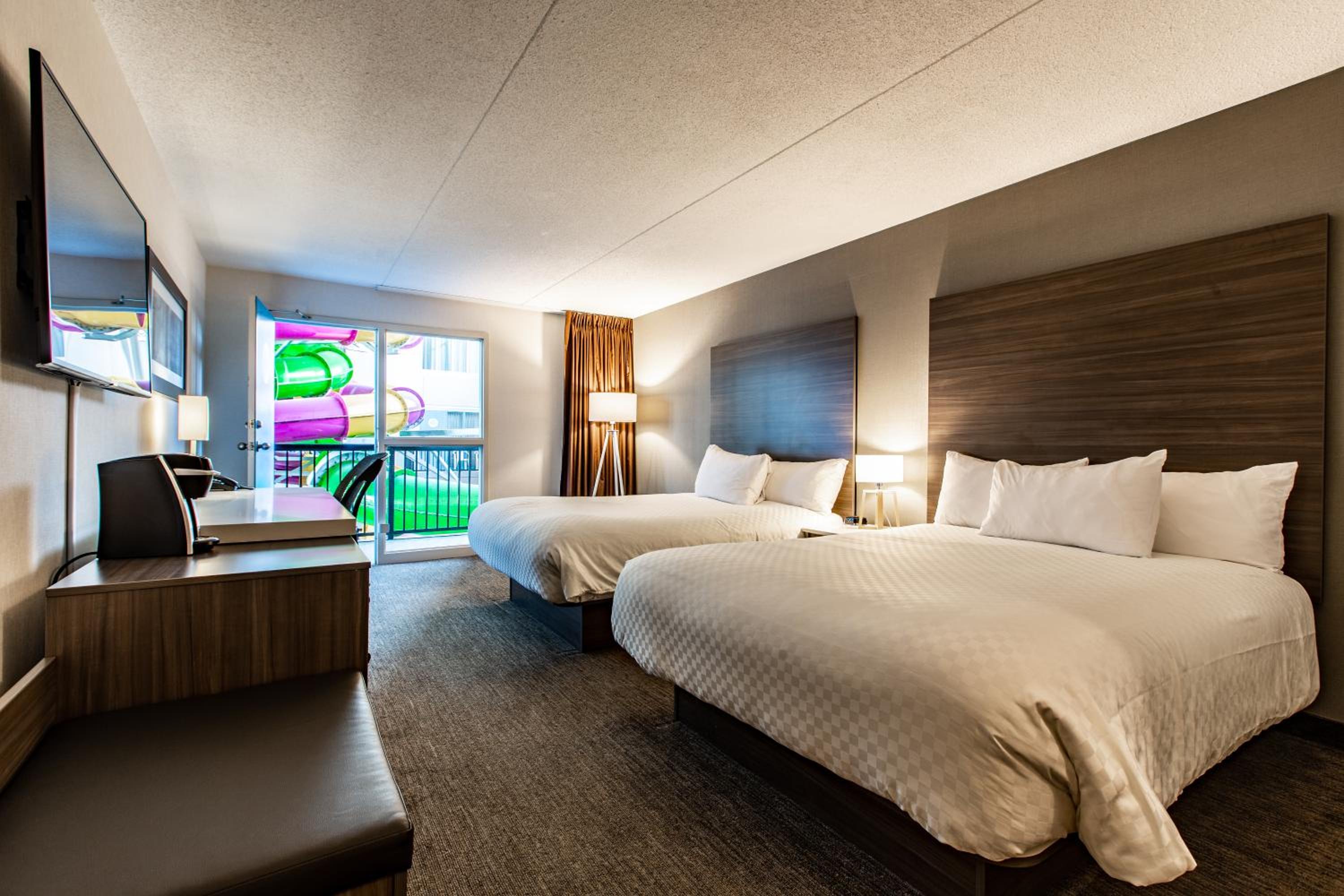 Deluxe Queen Room with Two Queen Beds - Non-Smoking photo 1