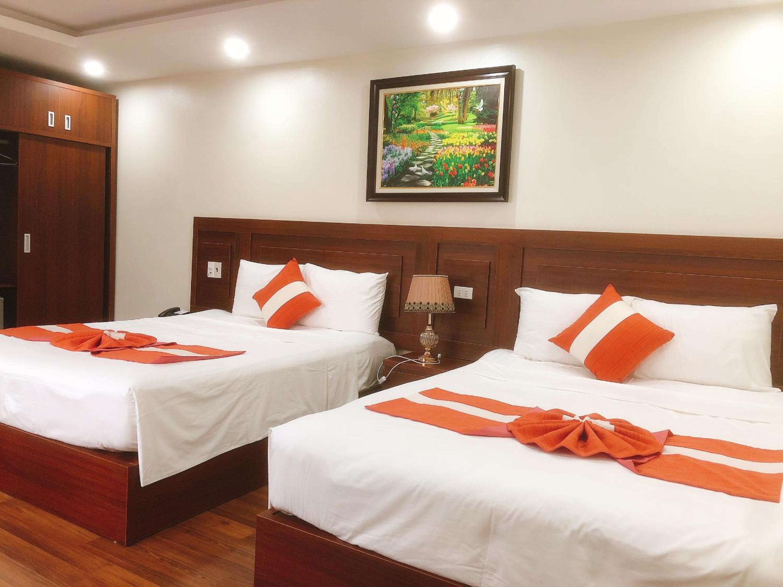 Deluxe Queen Room with Two Queen Beds - Photo 2