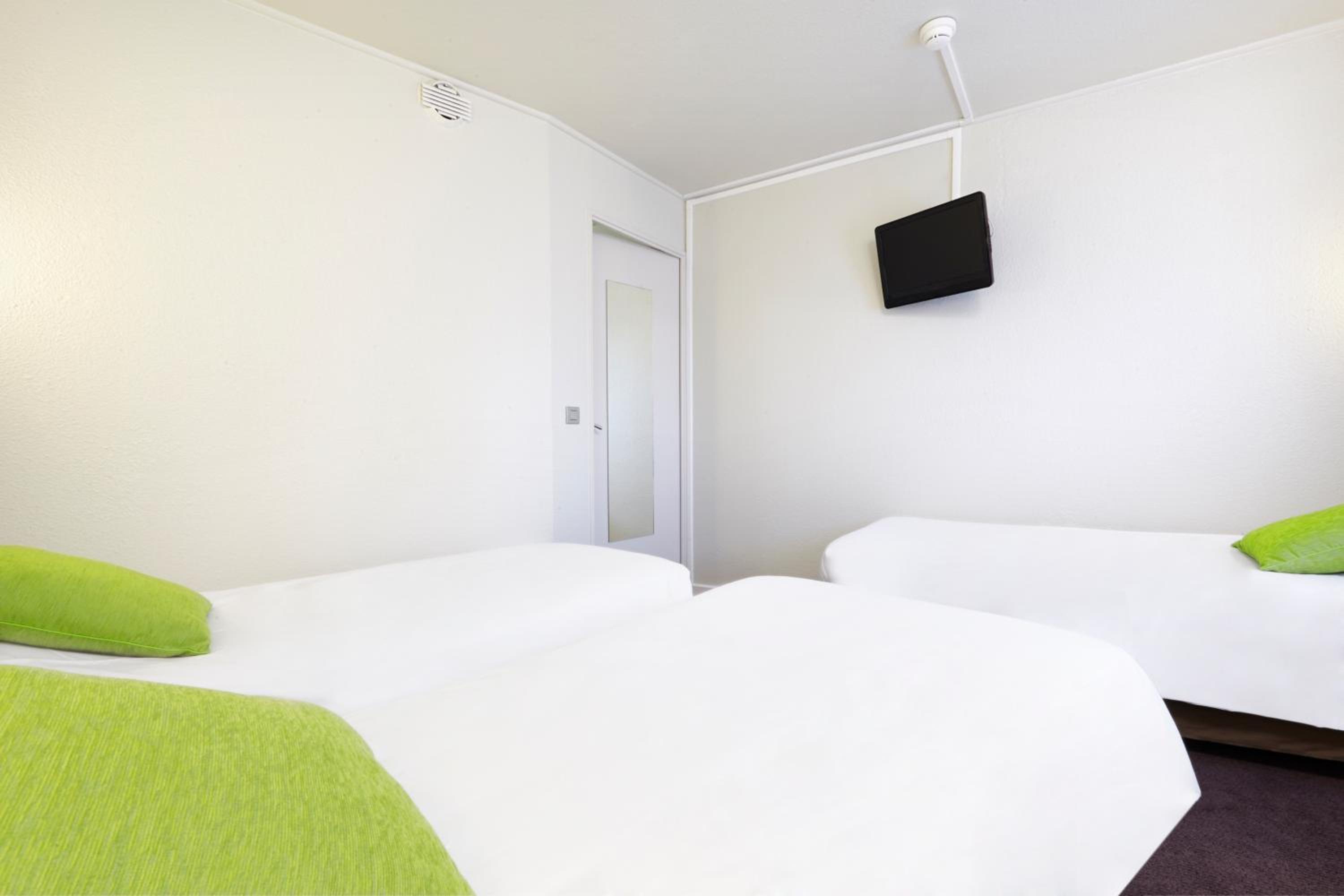 Standard Queen Room with One Queen Bed, One Sofa Bed and One Bunk Bed photo 2