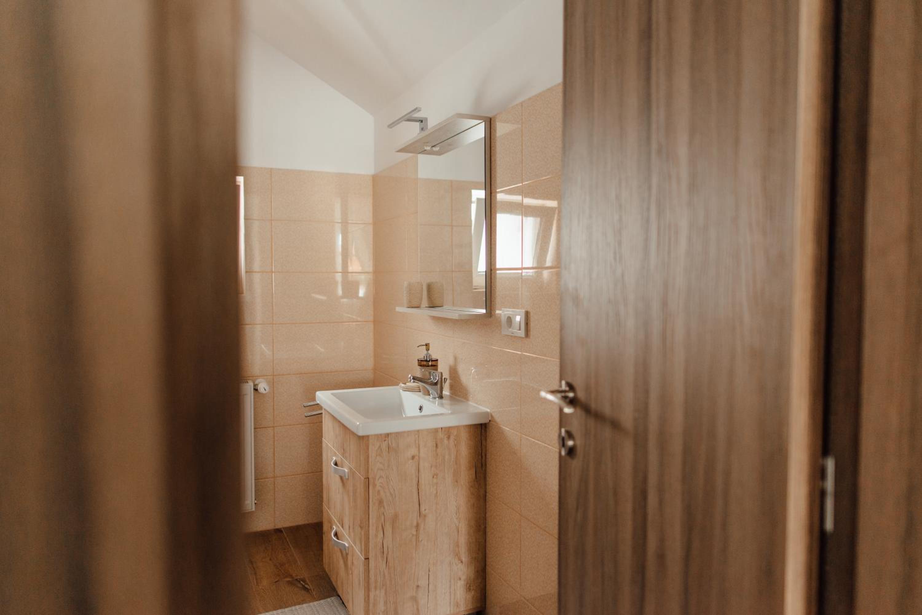 Three-Bedroom Apartment - Photo 17