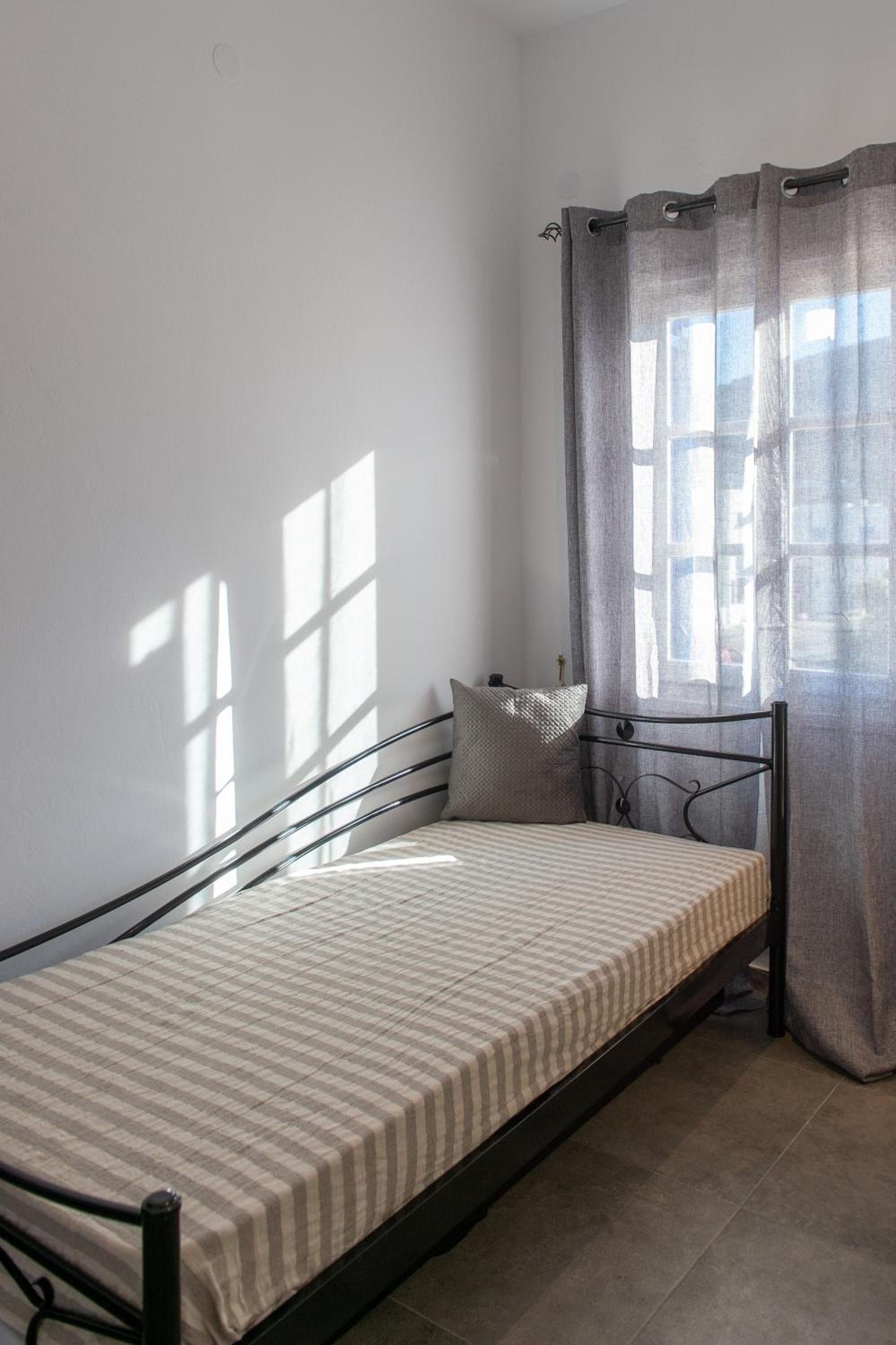Quarto Familiar com Varanda