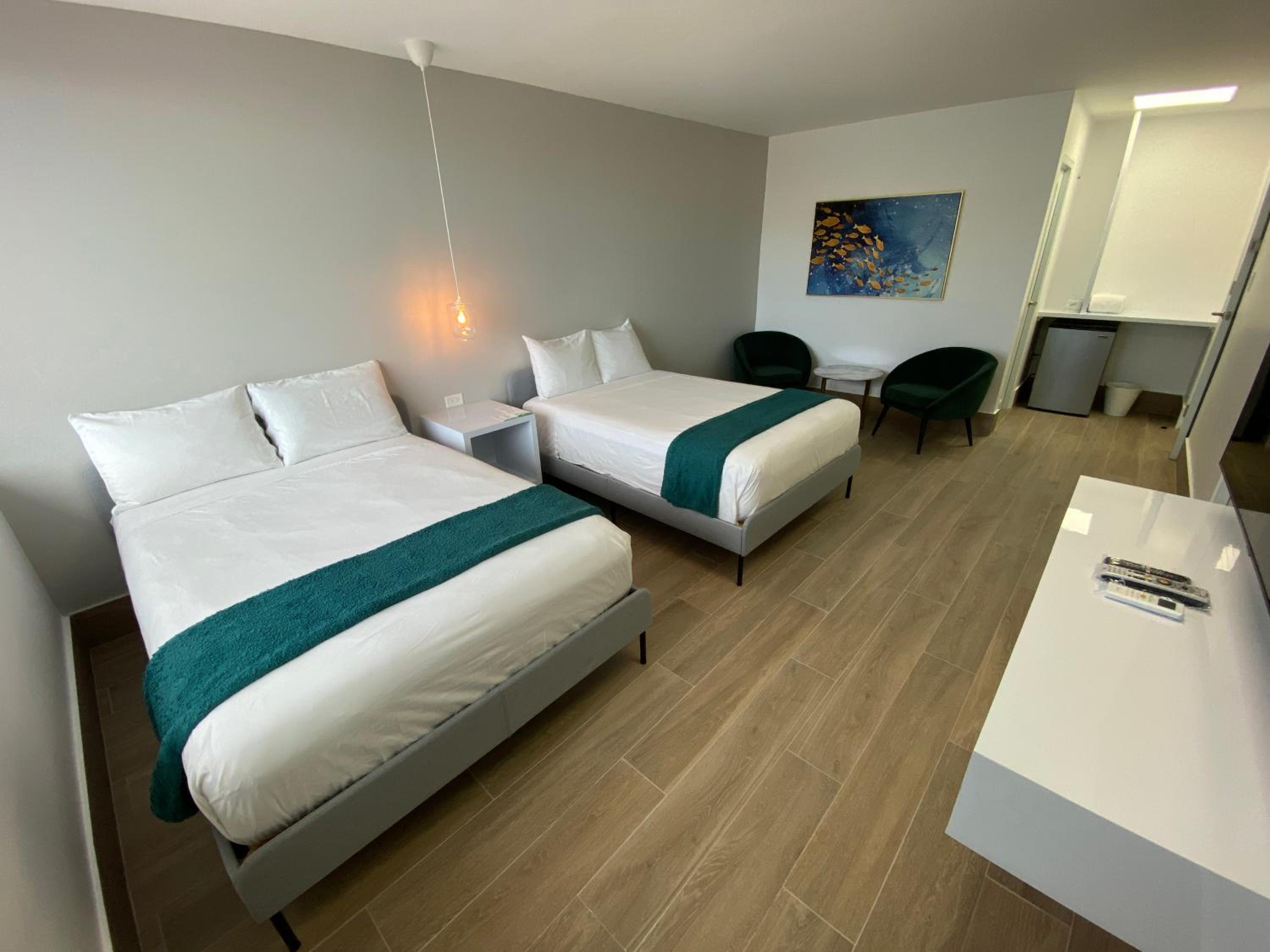 Ocean View Room with Balcony, Two Double Beds photo 2