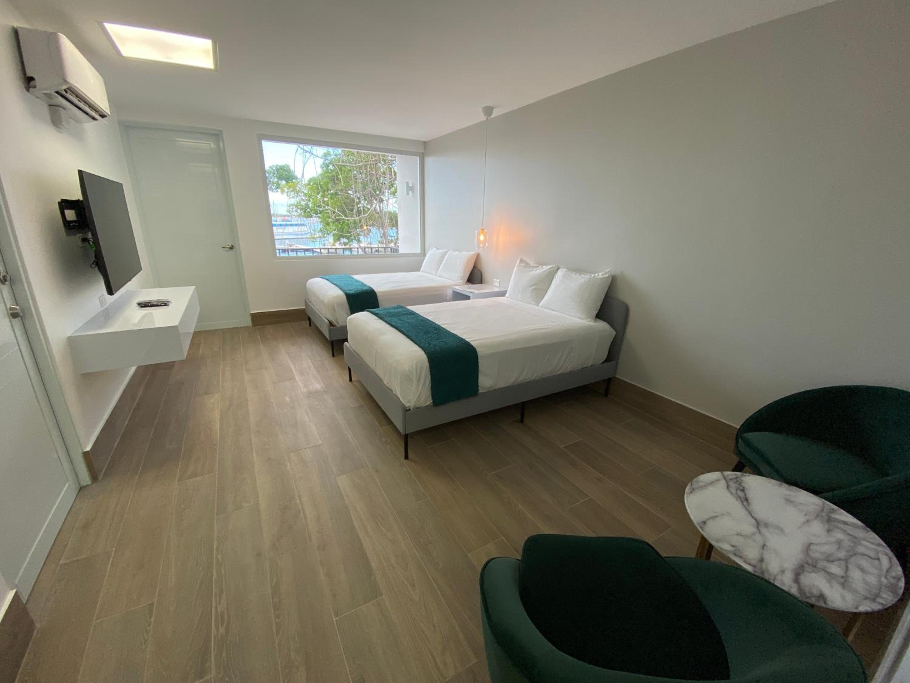 Ocean View Room with Balcony, Two Double Beds photo 3